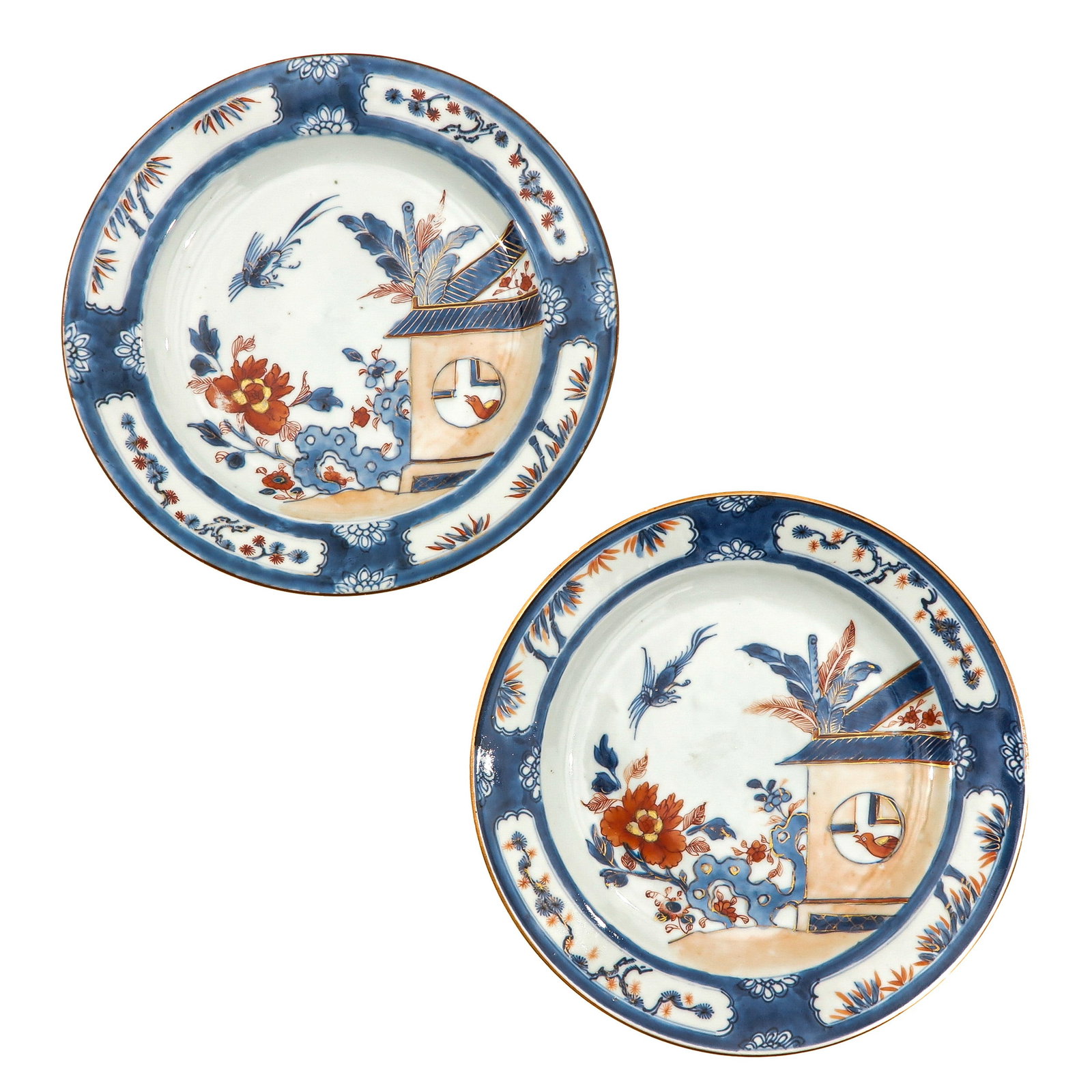 A Pair of Imari Plates: Depicting house with birds and flowers, 18th Century, 23 cm. in diameter, chip.