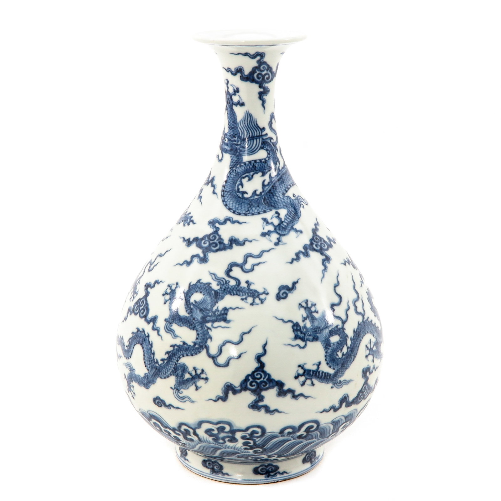 A Blue and White Bottle Vase: Decorated with dragons and clouds, Xuande mark, 29 cm. tall.