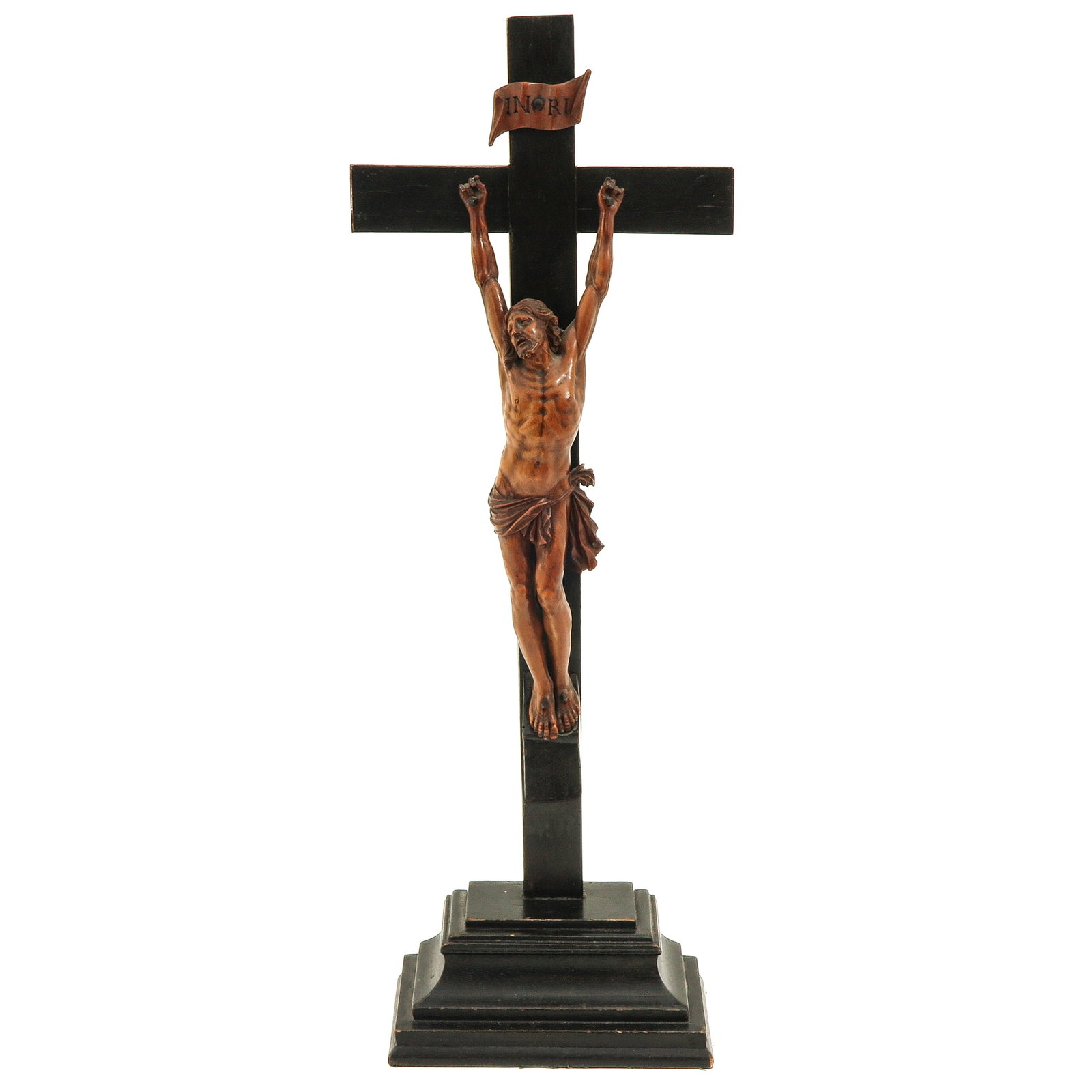 A Crucifix: with a Corpus Christi of palm wood, South Dutch Baroque, ca. 1700, height 60 cm.