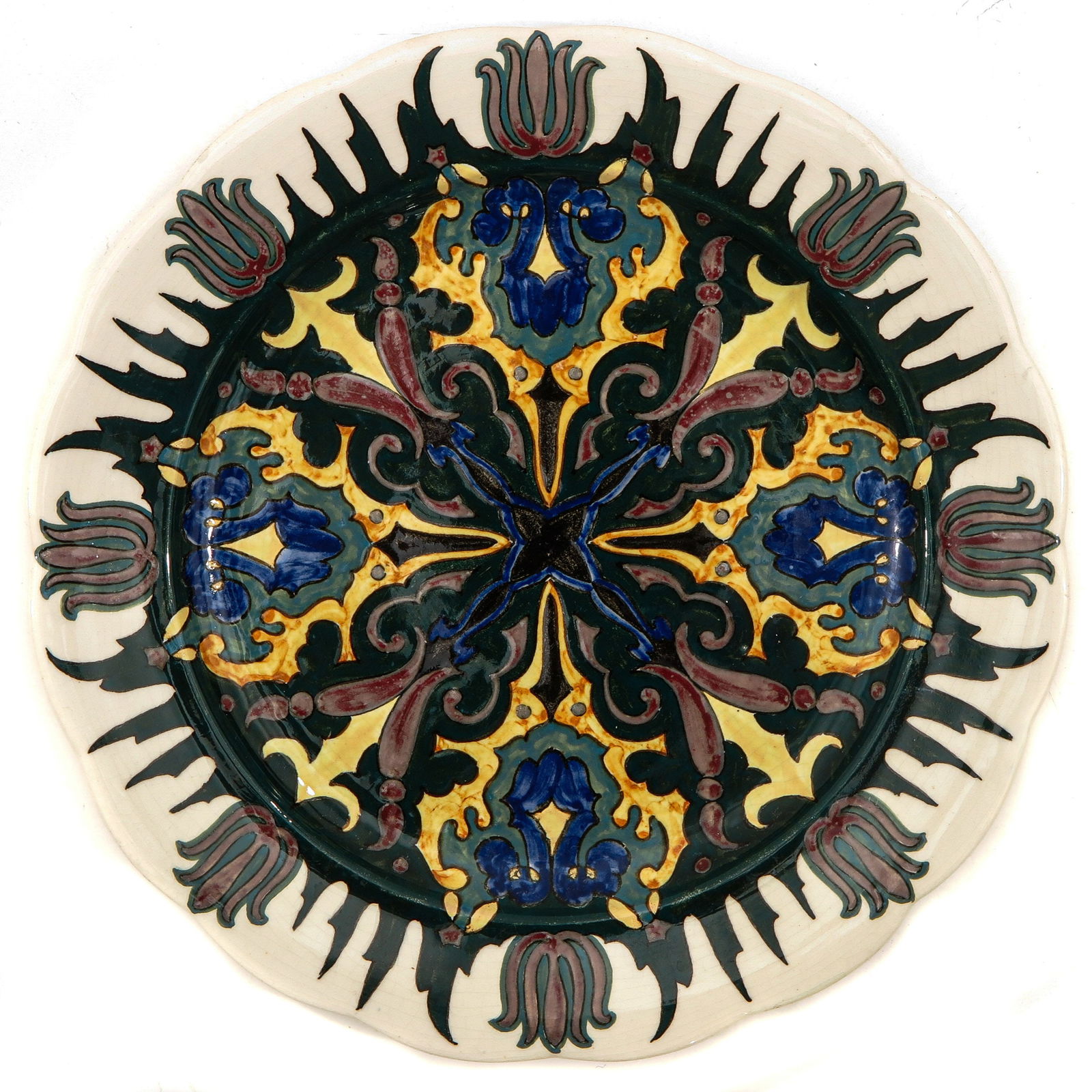 A Rozenburg Dish: earthenware, marked Rozenburg Den Haag, diameter 21 cm.