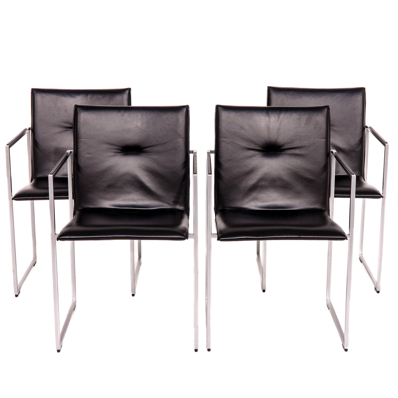 A Set of 4 Dining Chairs: Brand Arco, height 83 cm.