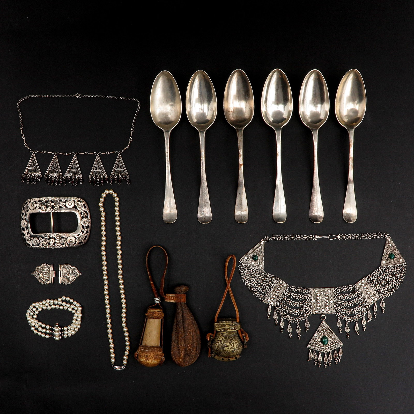 A Collection of Silver Cutlery and Jewelry: Consisting of silver cutlery parts and jewelry