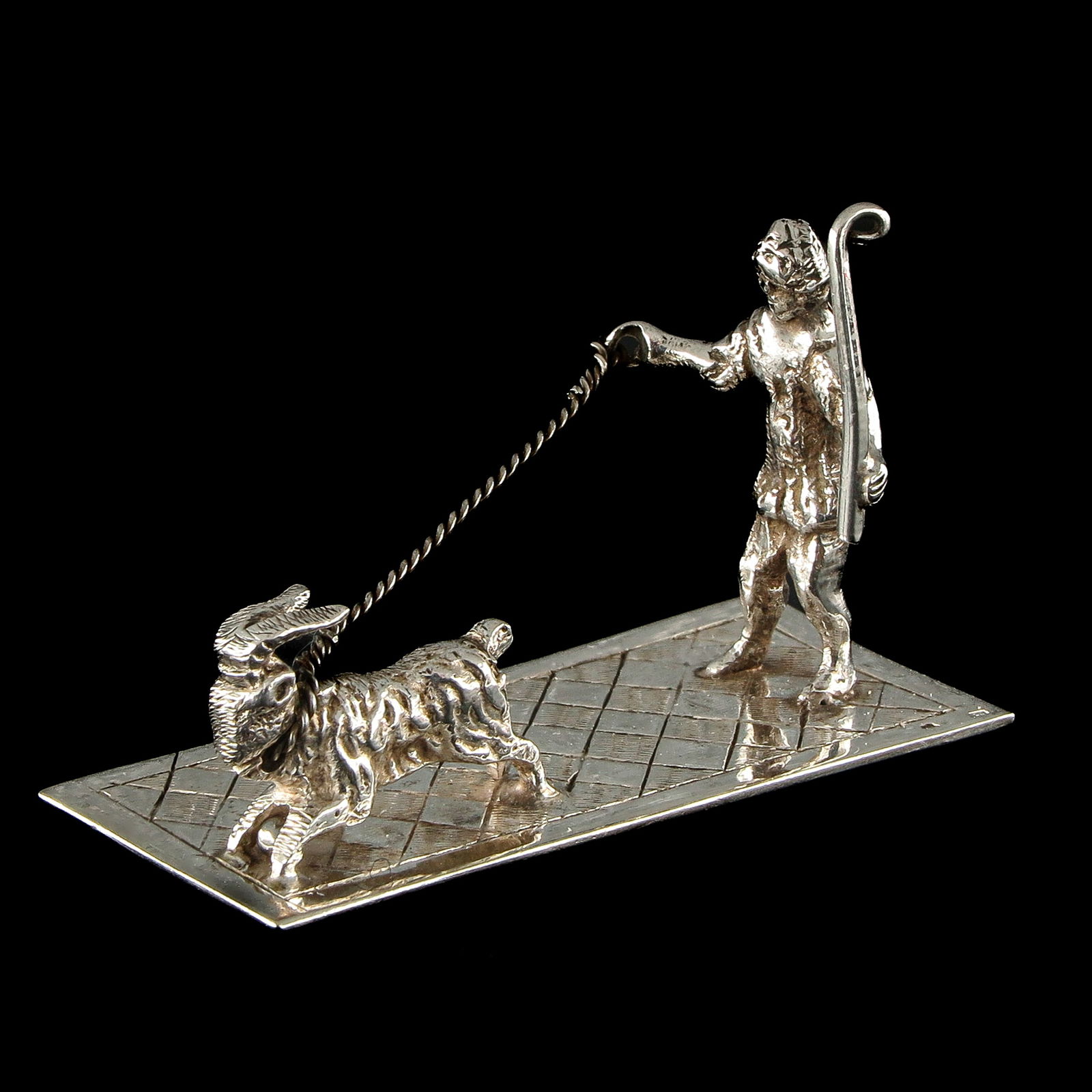 A Miniature Silver Man with Goat (1 of 8)