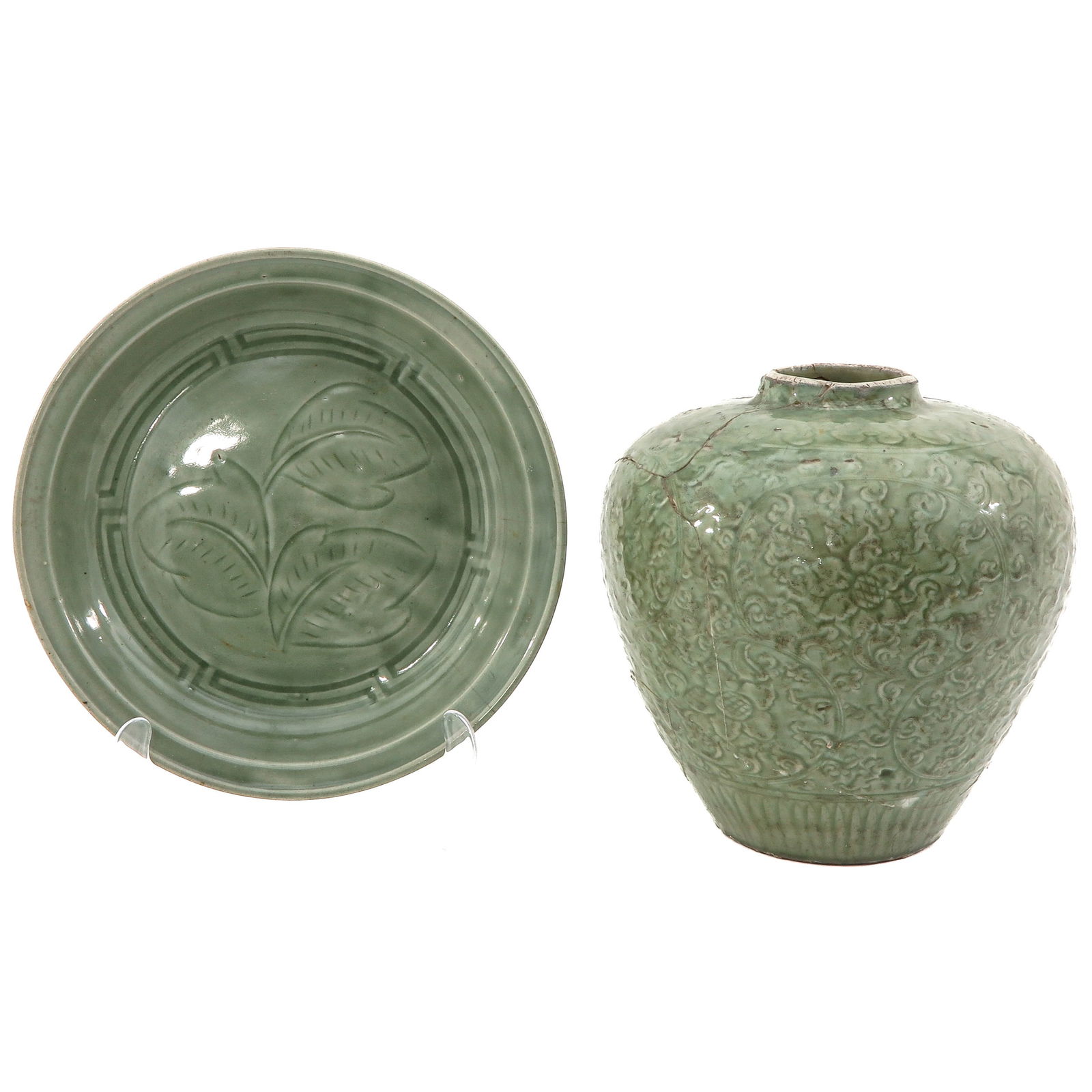 A Celadon Charger and Jar: Charger is 36 cm. in diameter, vase is 30 cm. tall, in diverse conditions.
