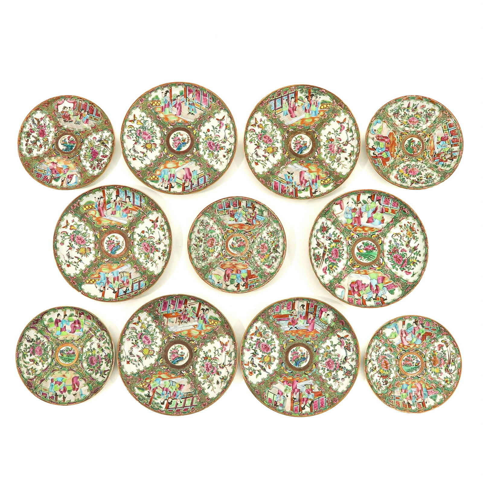 A Varied Collection of 11 Rose Medallion Plates: Largest plates are 24 cm. in diameter, in diverse conditions.