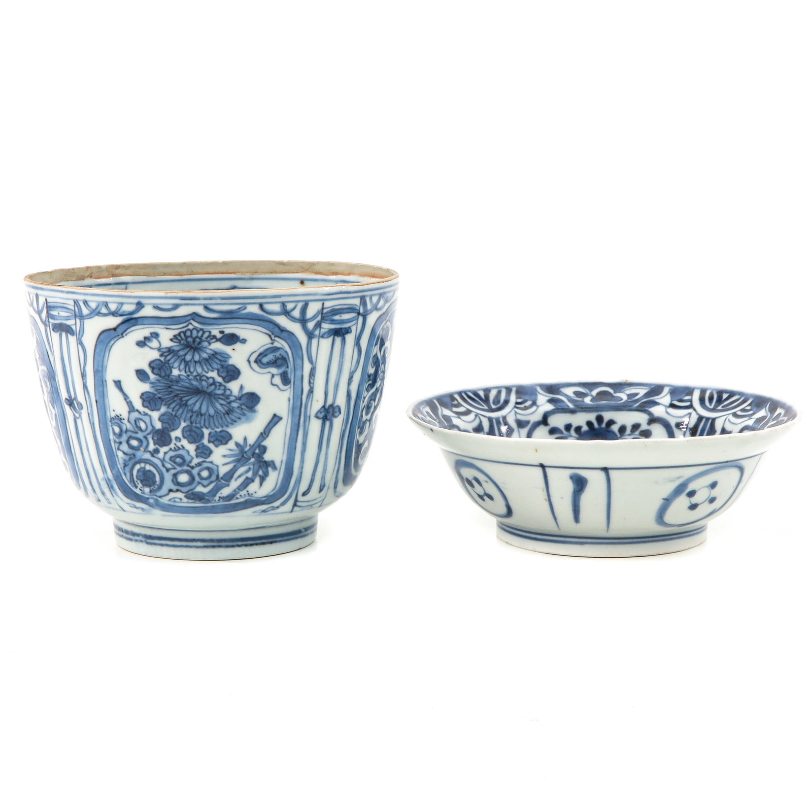 A Lot of 2 Blue and White Bowls: Including bowl circa 1700 decorated with deer in garden 15 cm. in diameter and Wanli Period bowl with floral scenes and perched cow in center of bowl 14 cm. in diameter.