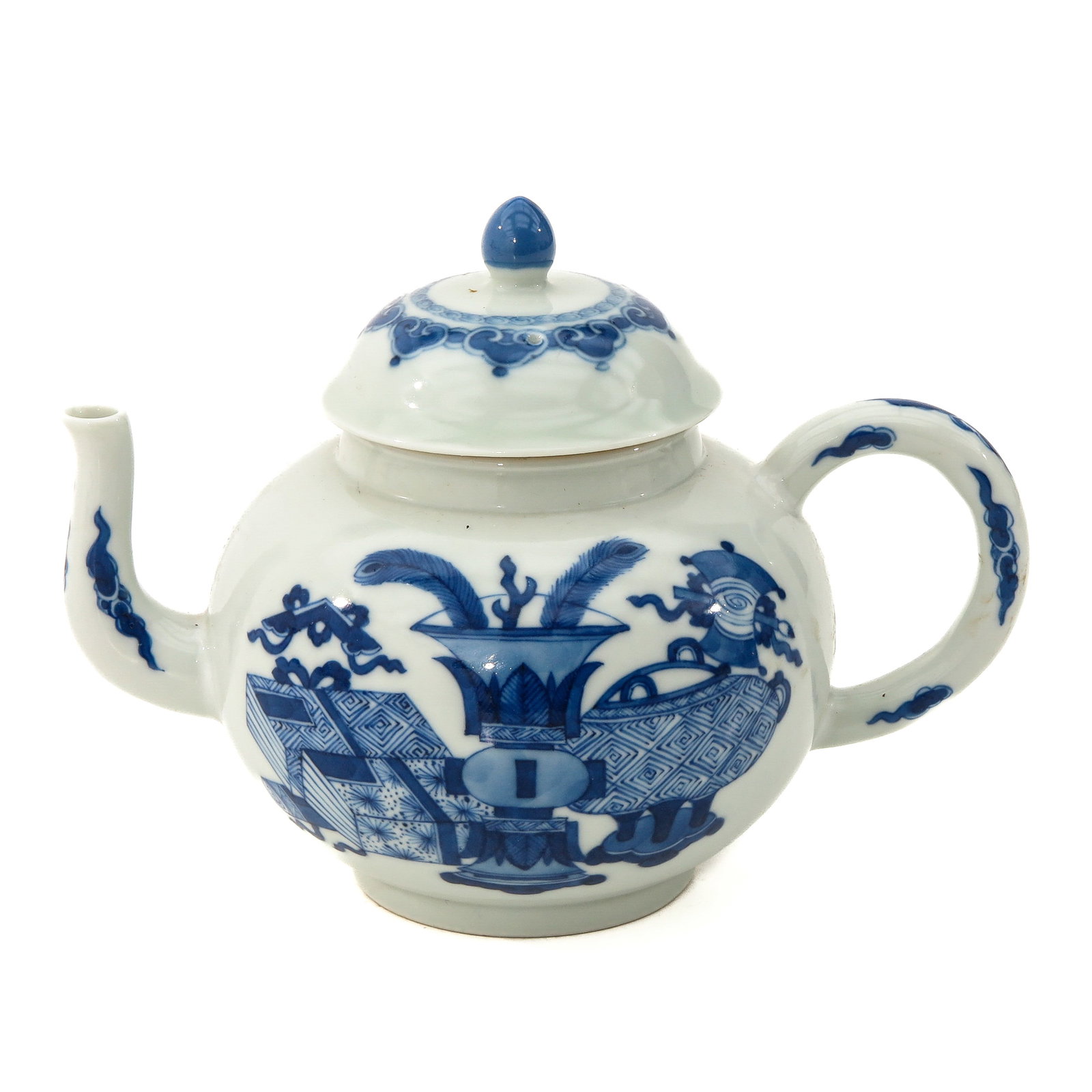 A Blue and White Teapot: Decorated with Chinese antiquities, Jiaqing mark, 12 cm. tall.