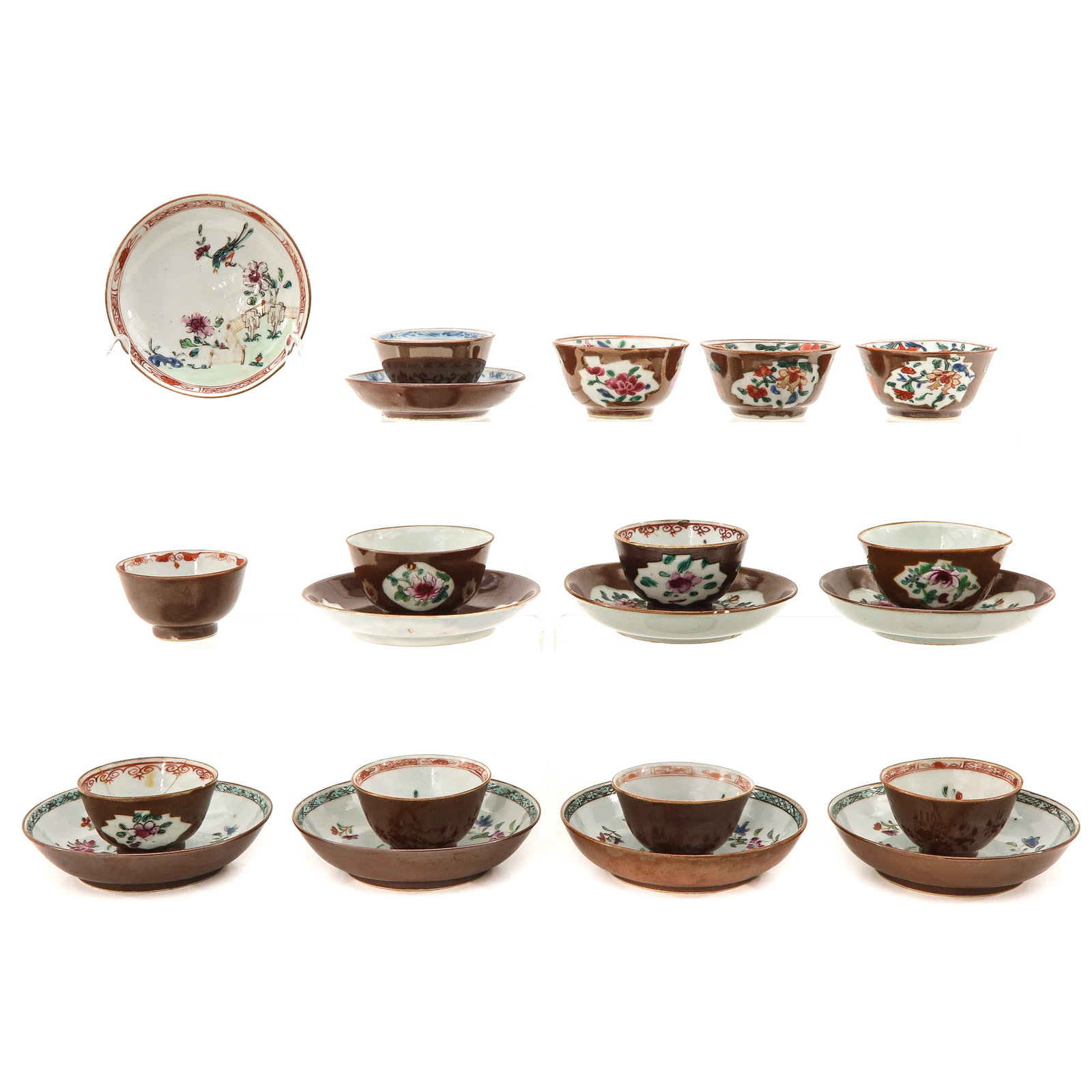 A Collection of Batavianware Cups and Saucers: In a variety of decors and sizes, including 18th Century, largest saucer is 13 cm. in diameter, chip and hairline.