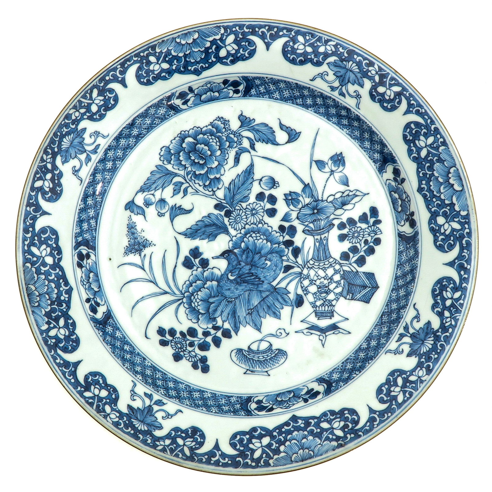 A Blue and White Charger: Depicting flowers and duck, 18th Century, 37 cm. in diameter.
