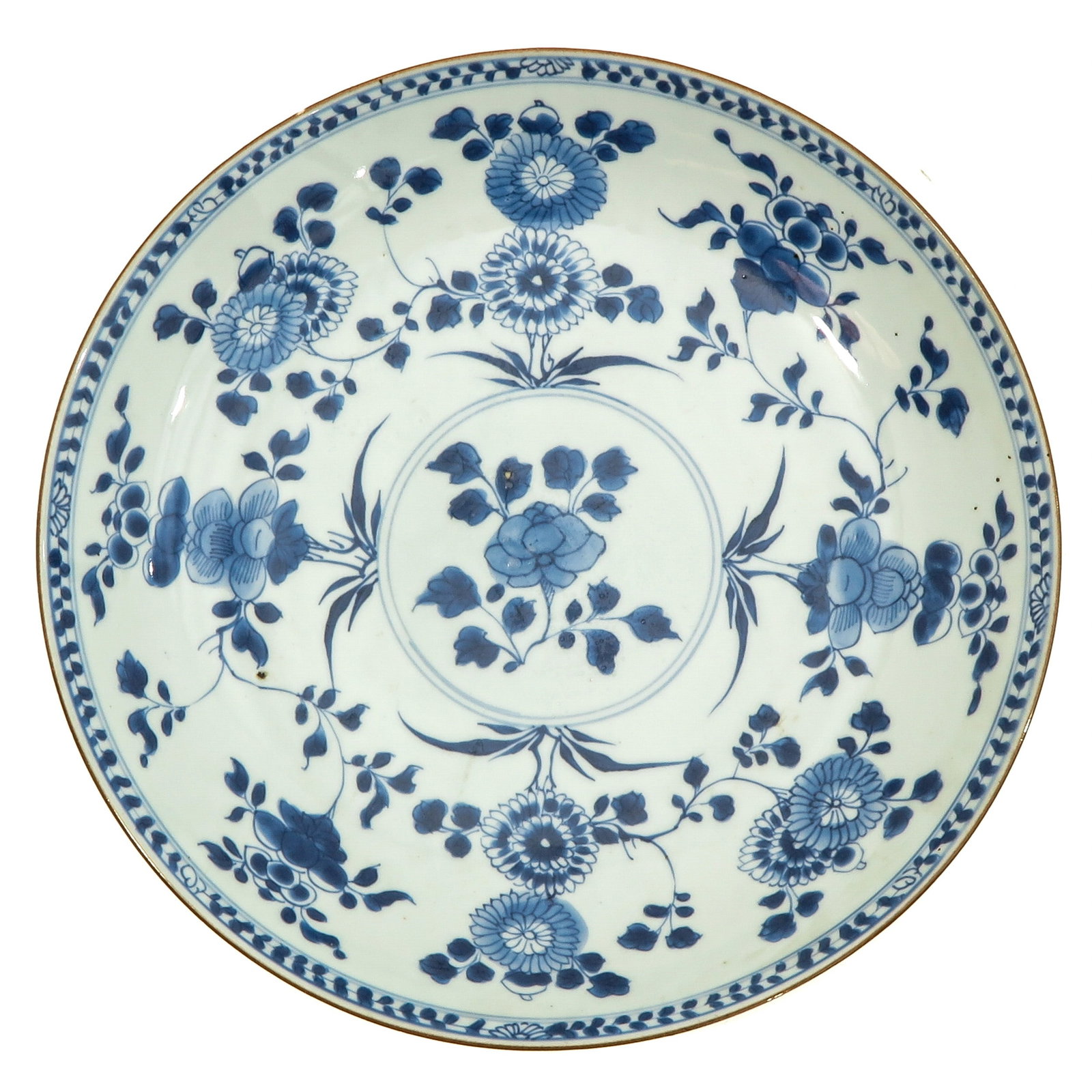 A Blue and White Plate: Floral decor, 18th Century, 28 cm. in diameter.