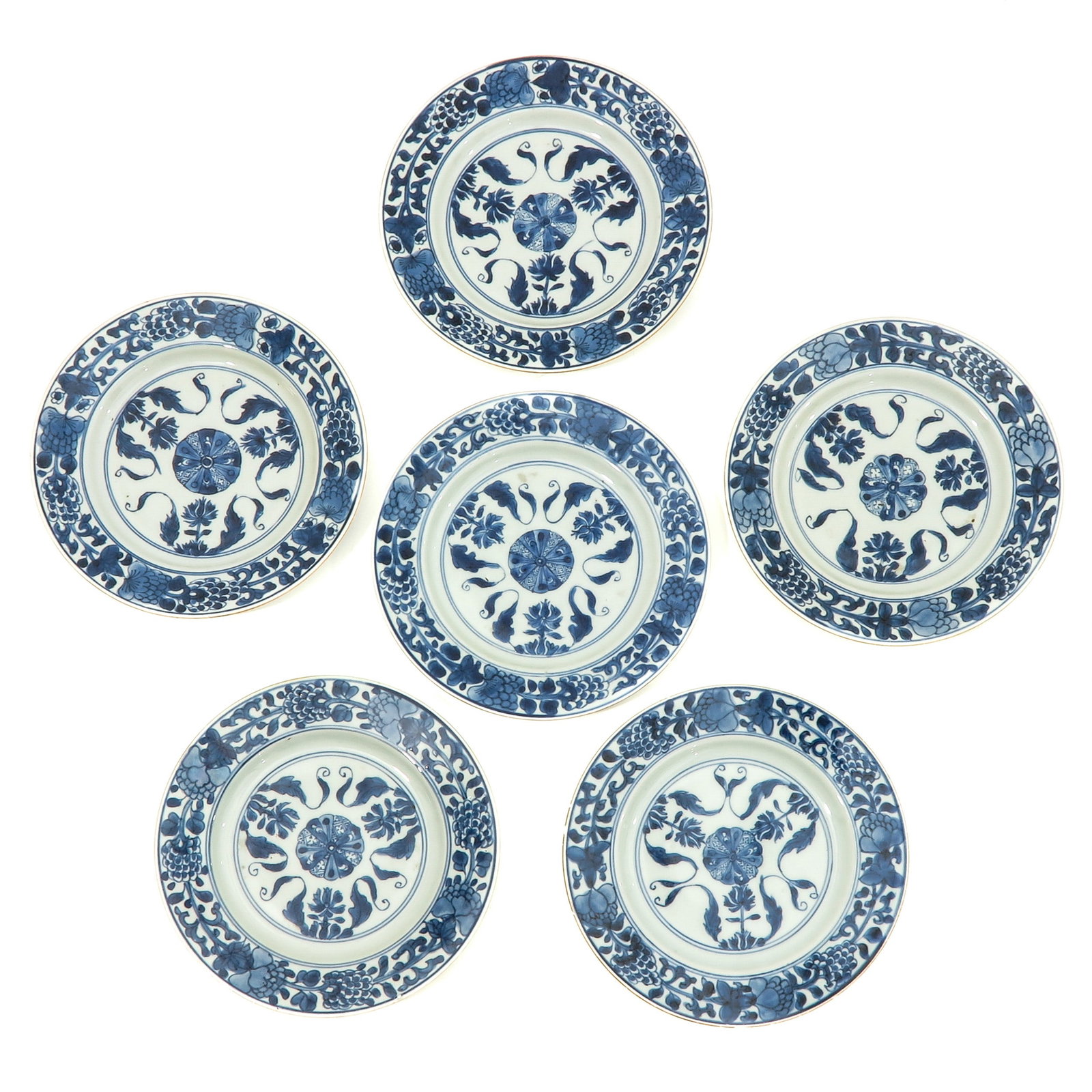 A Series of 6 Blue and White Plates: Floral decor, 18th Century, 22 cm. in diameter.