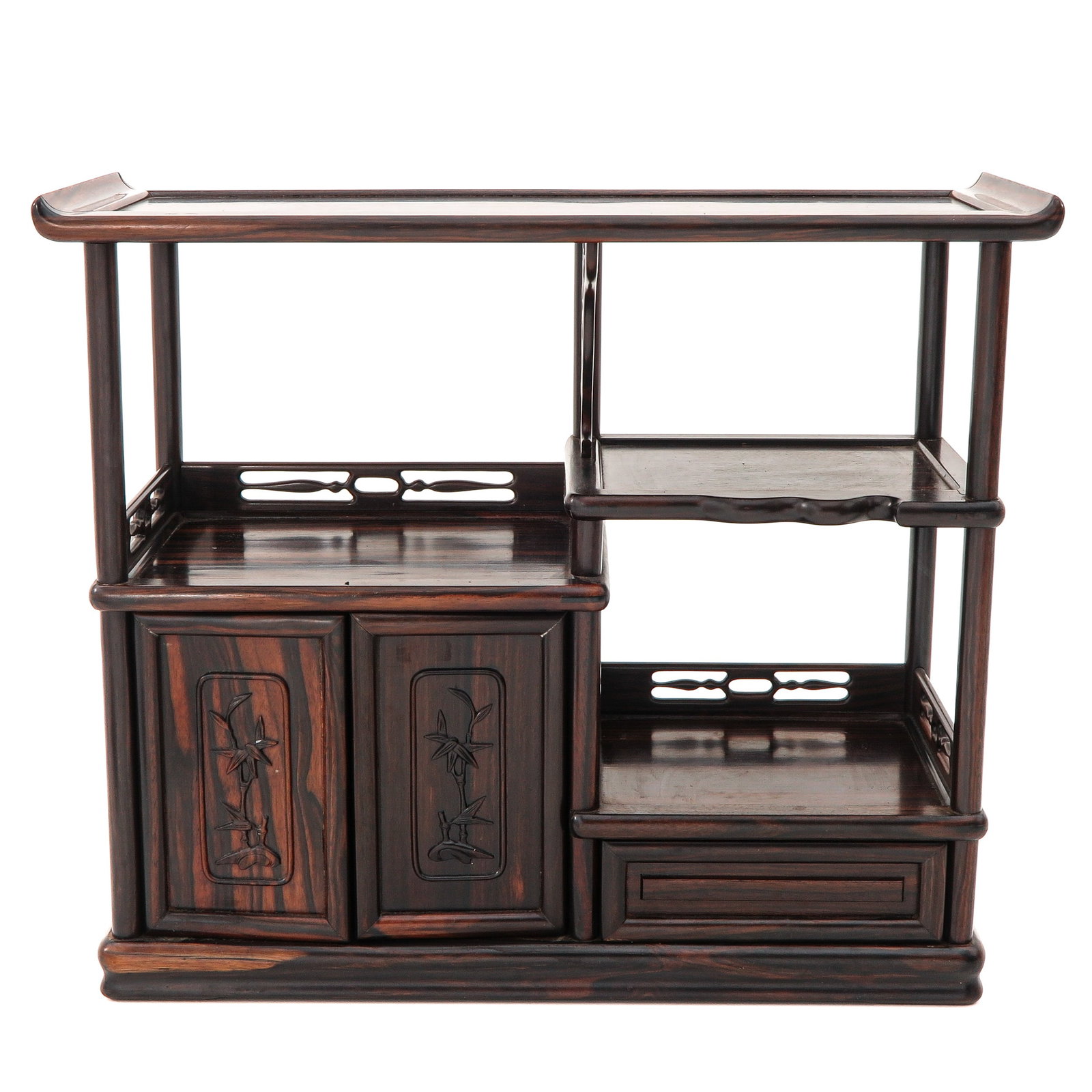 A Carved Wood Chinese Display: With 2 doors and drawer, decorated with bamboo, 39 cm. tall.