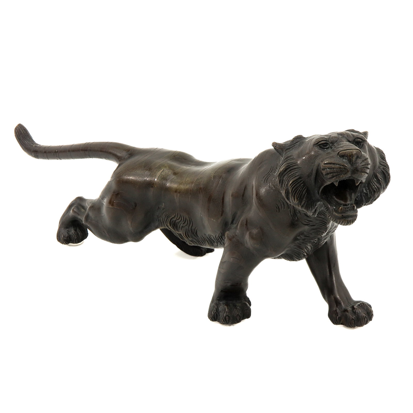 A Bronze Sculpture: bronze, depicting the tiger, length 43 cm.