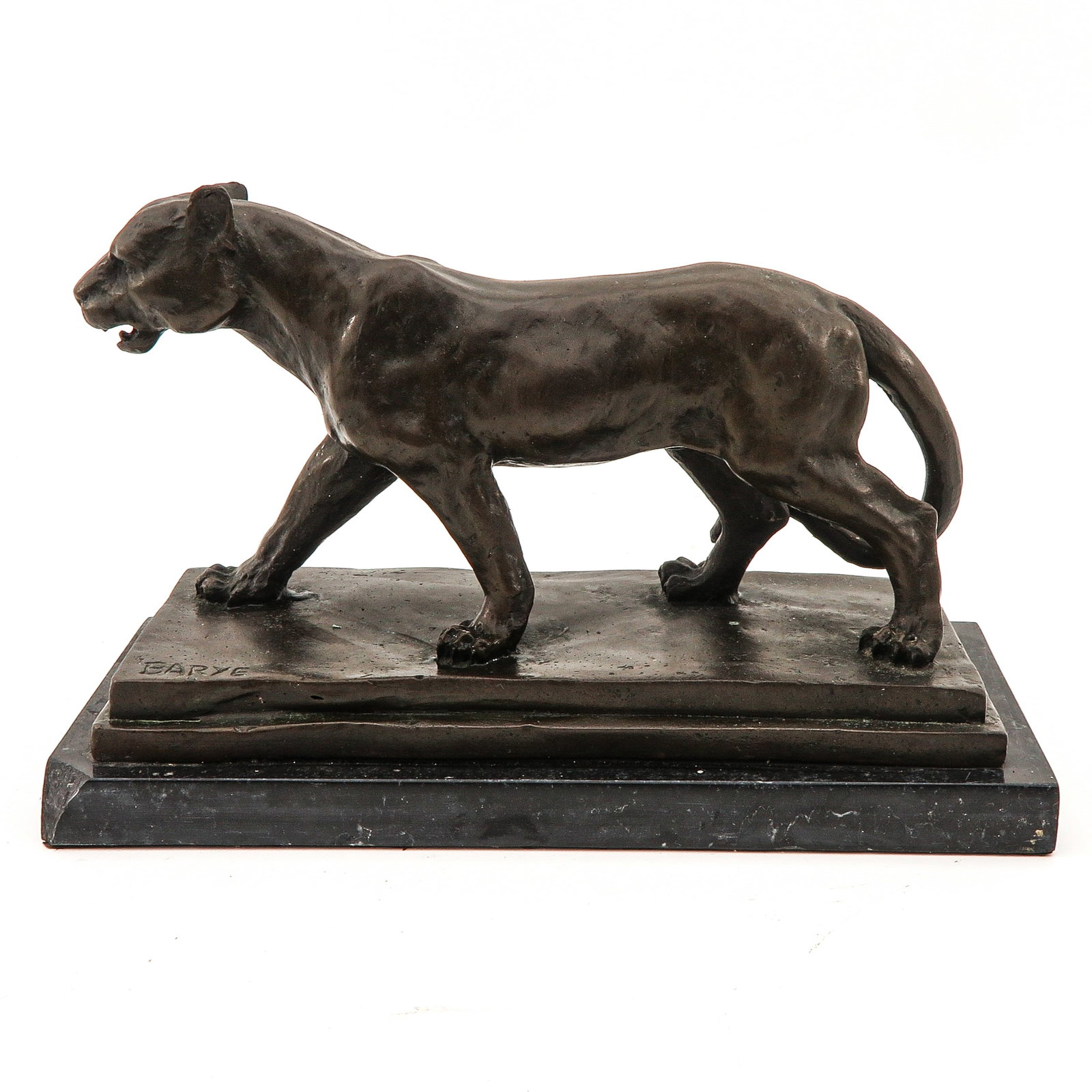 A Bronze Sculpture: bronze on marble base, signed Barye, depicting cougar, length 24 cm.