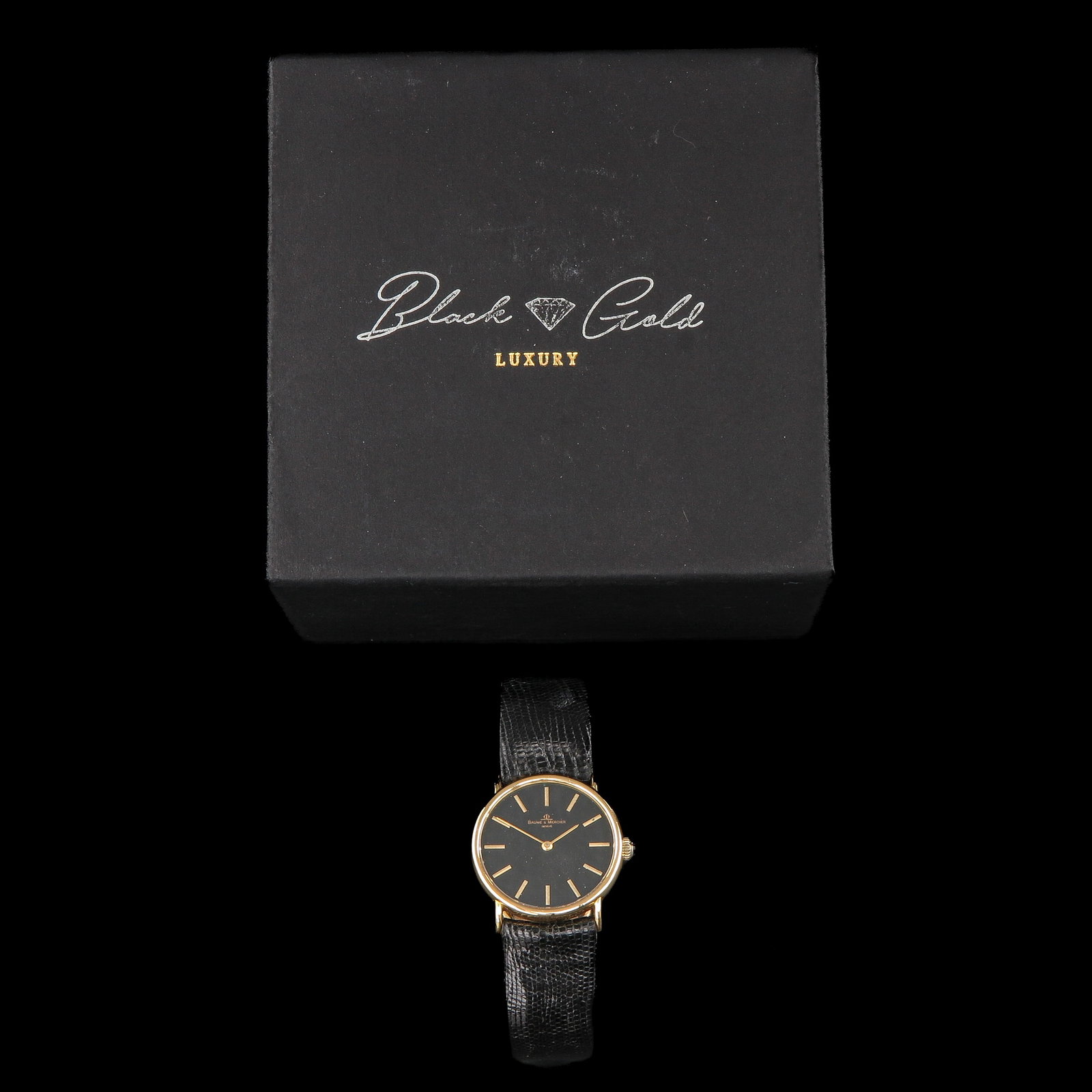 A Men's Watch: brand Baume & Mercier, 1970, 18 carat gold case, on leather strap, case diameter 30 mm.