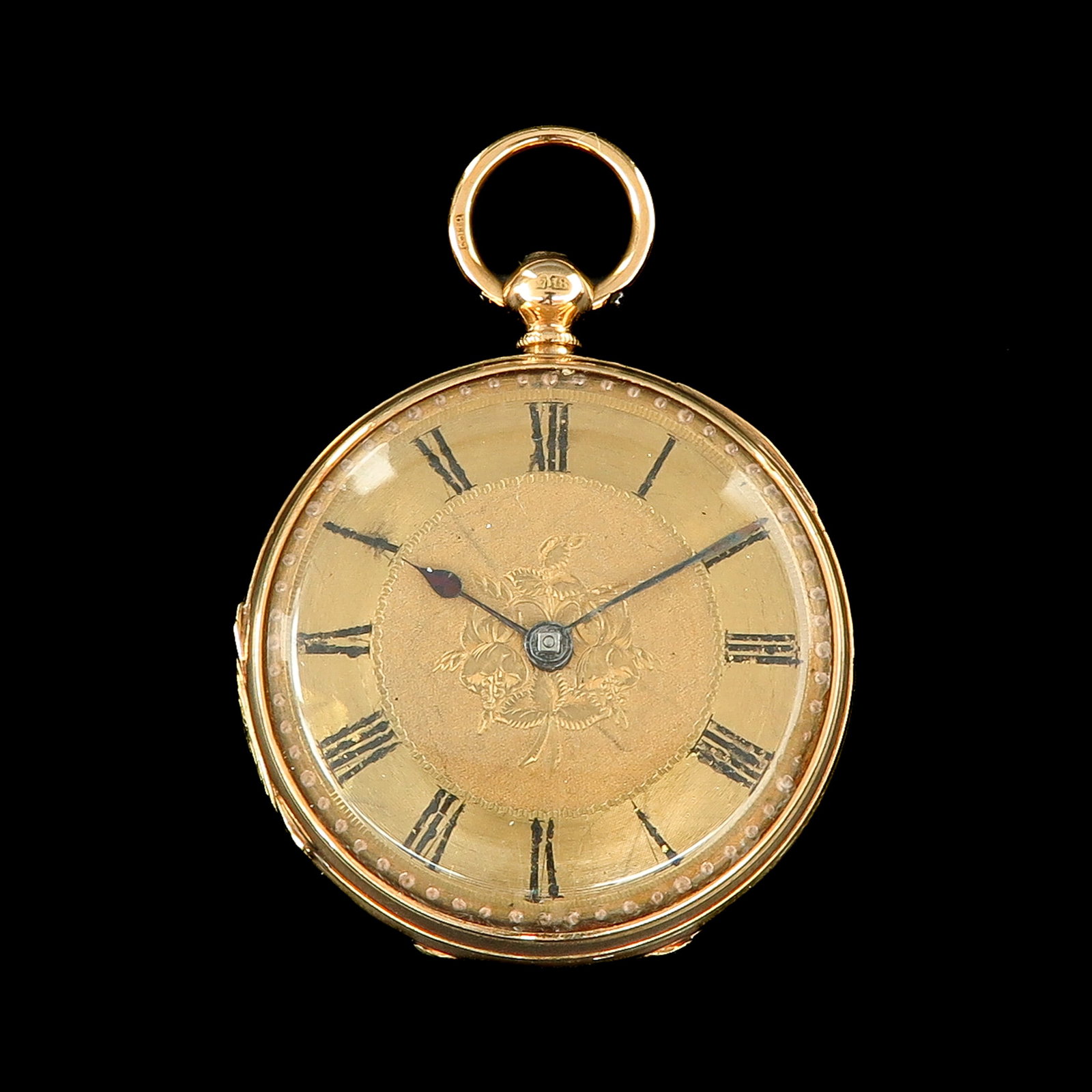 A Pocket Watch: 18 carat gold, U.B.&W., with engraving of flowers, diameter 38 mm., weight 46 grams