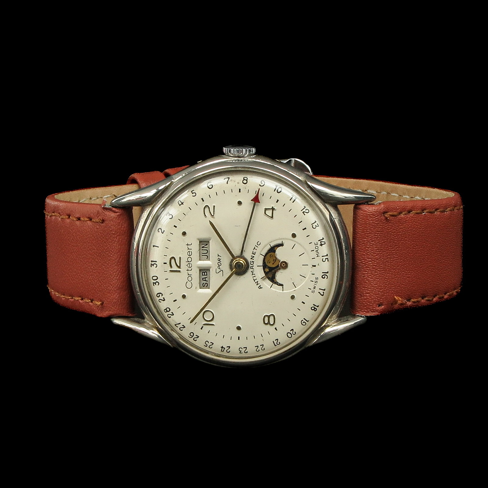 A Men's Watch: brand Cortébert, model Triple Date Fasi Lunare, 1940 - 1950, on leather strap, case diameter 33 mm.