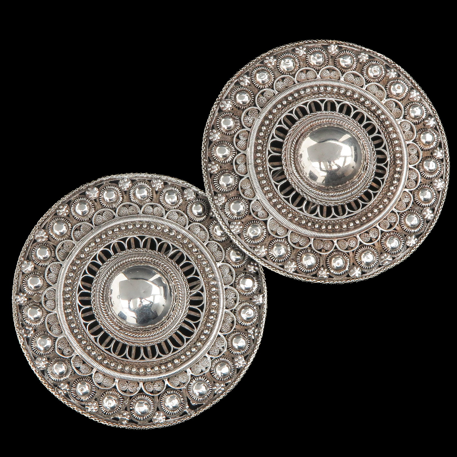 A Pair of Dutch Broekstukken: silver, Zuid-Beveland, date letter 1873, diameter 98 mm.