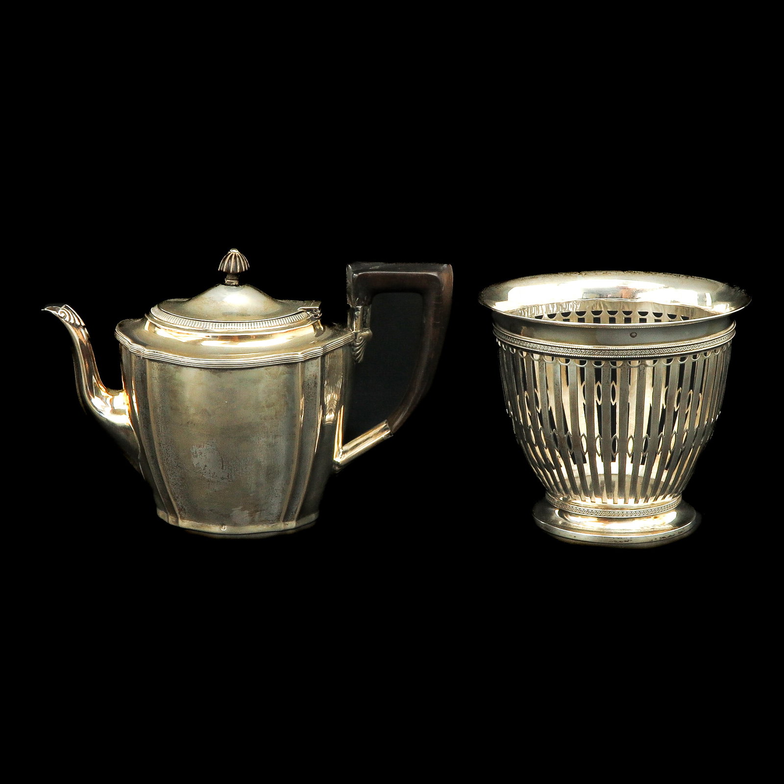 A Silver Coffee Pot and Basket: consisting of silver coffee pot and silver basket, A. Bonebakker & Zoon, height 12 cm.