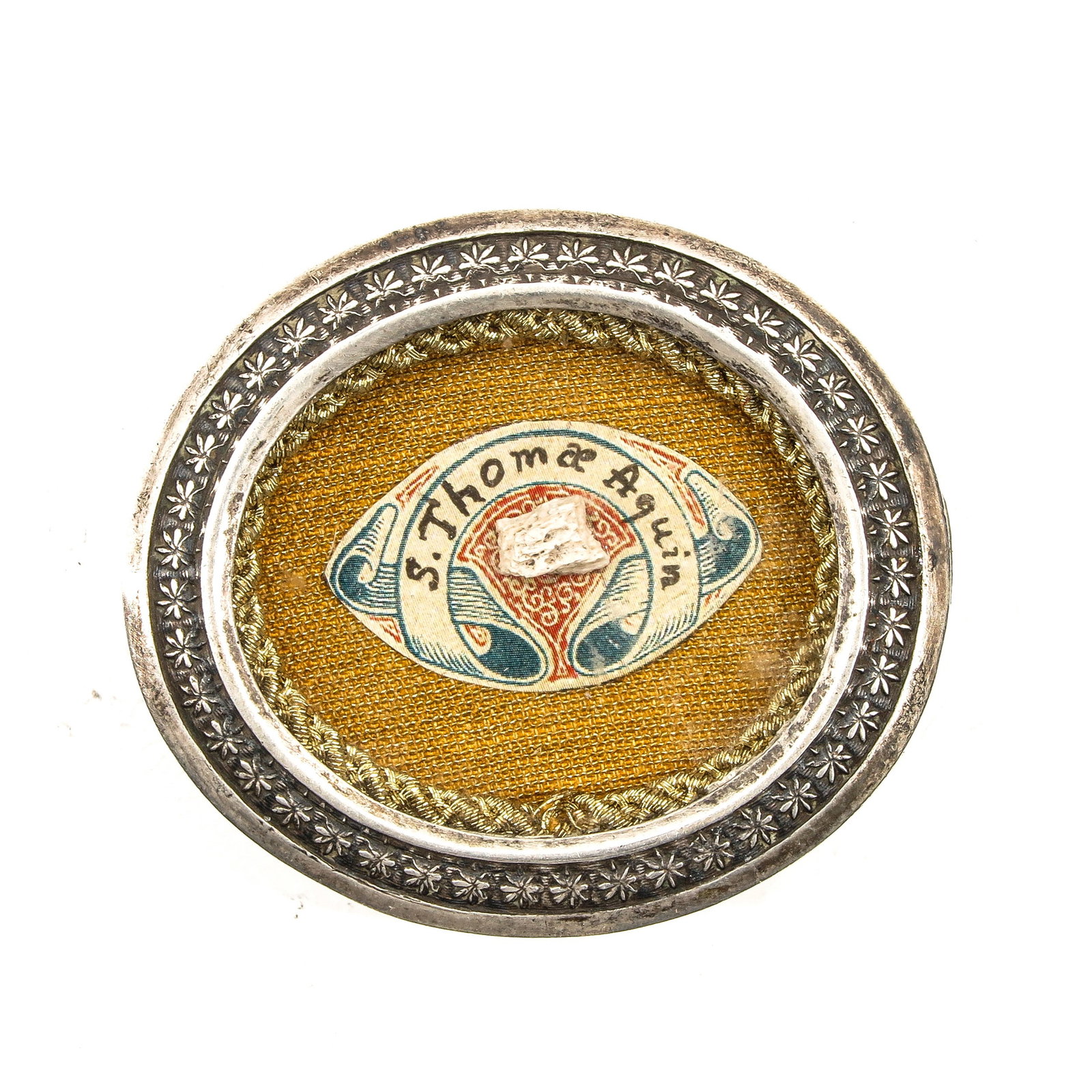 A Reliquary: containing relic of Saint Thomas Aquinas, diameter 5 cm.