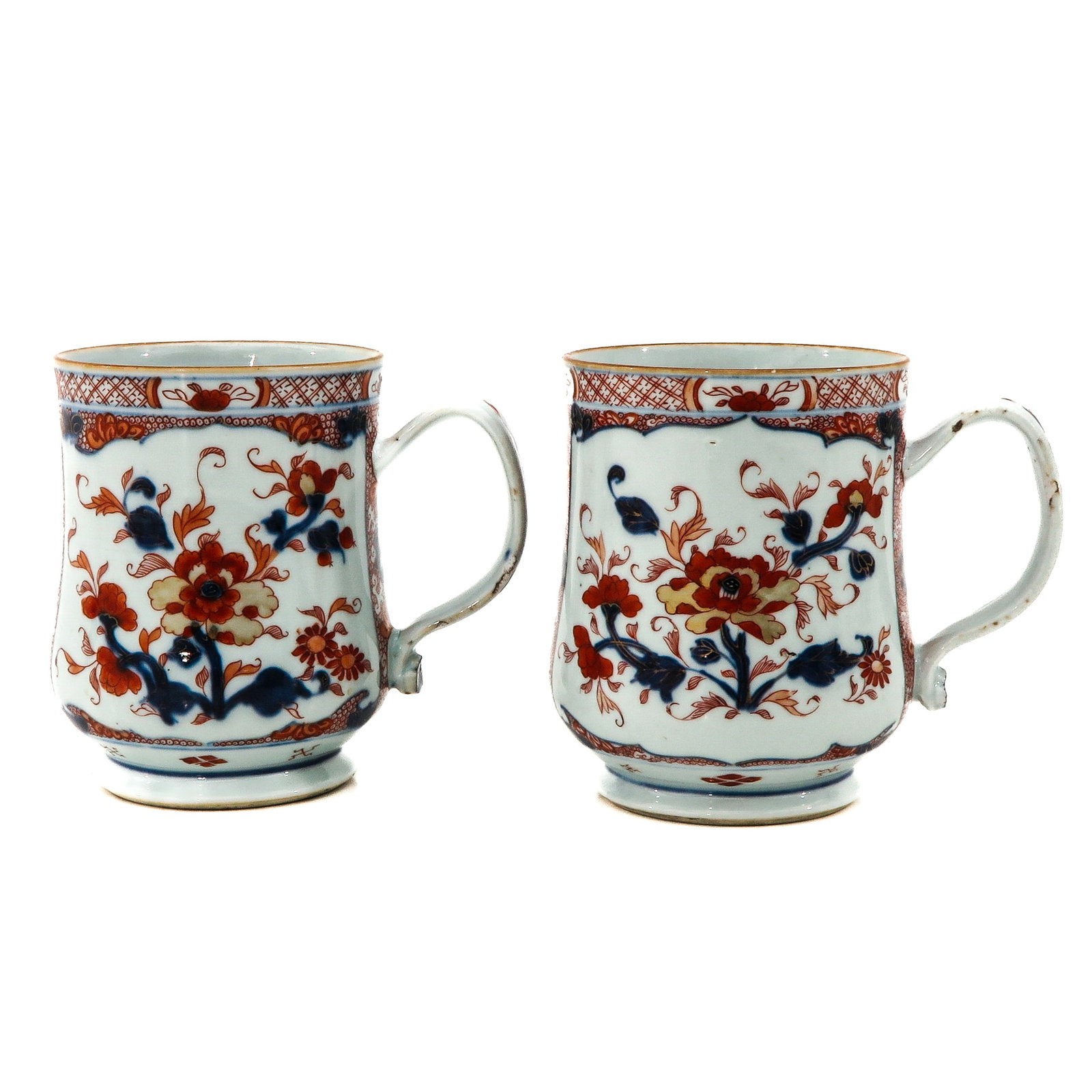 A Lot of 2 Imari Mugs: 18th Century, 16 cm. tall, fritting on handle.
