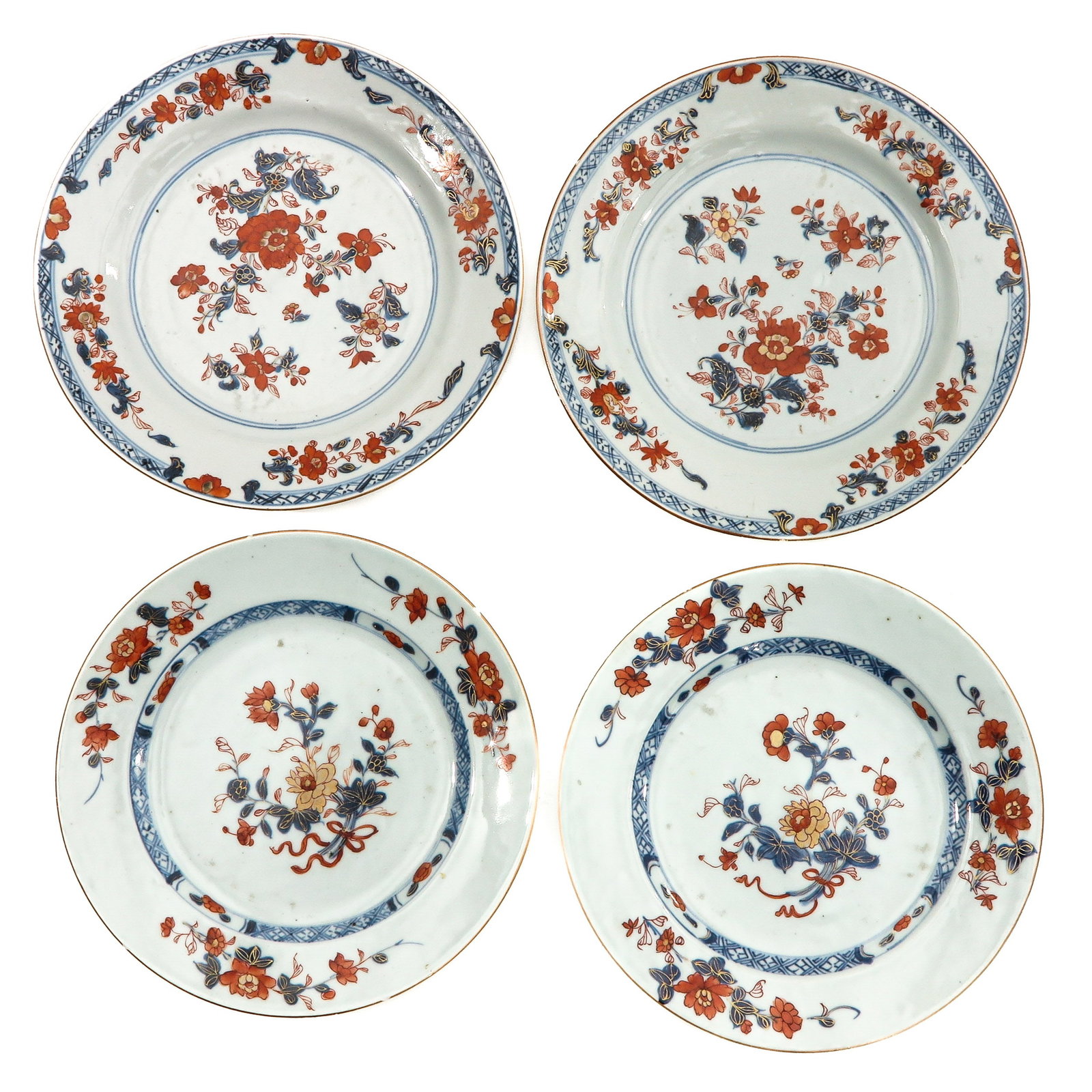 A Collection of 4 Imari Plates: Floral decor, 18th Century, 23 cm. in diameter, chip.