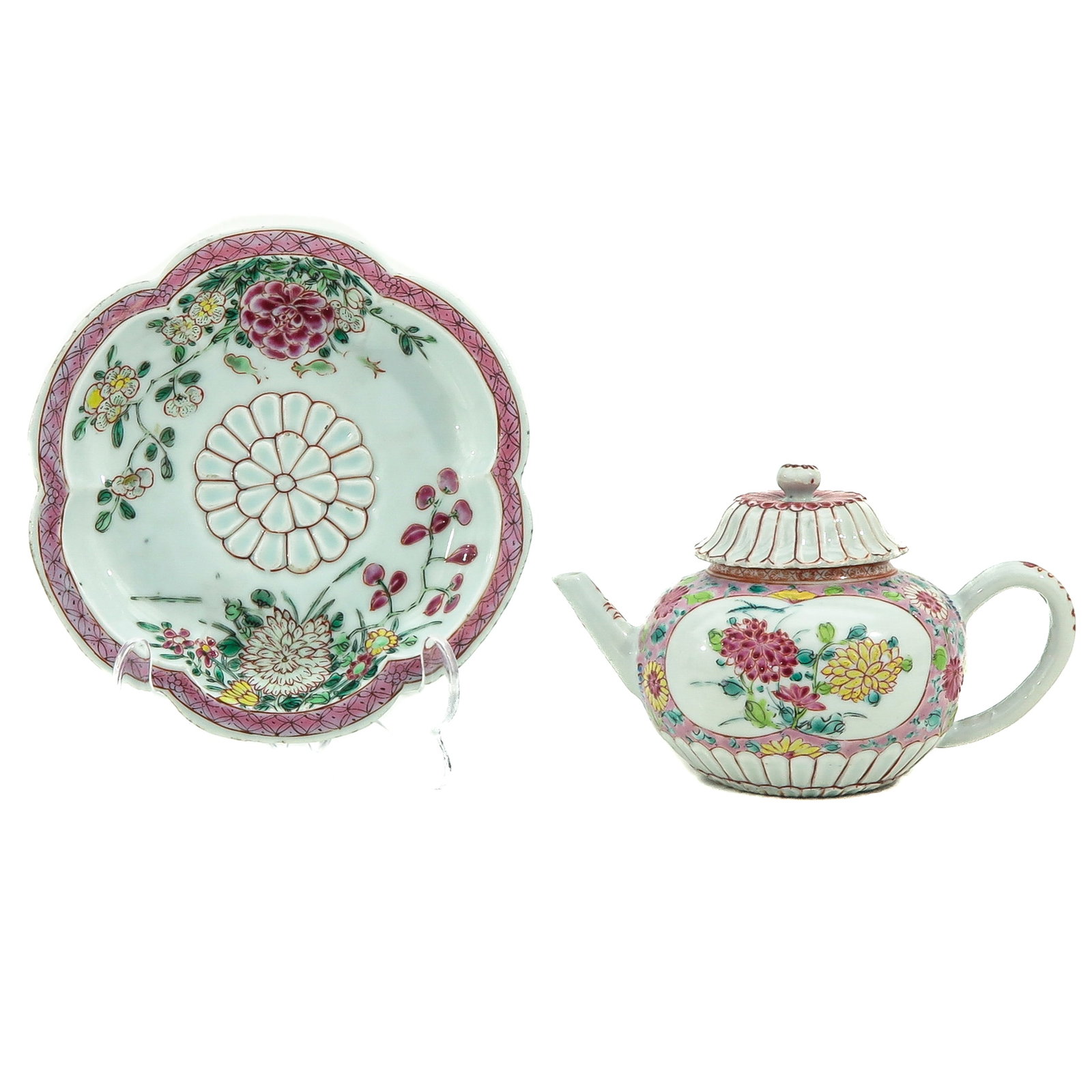 A Famille Rose Teapot on Stand: Yongzheng Period, floral decor, stand is 15 cm. in diameter.