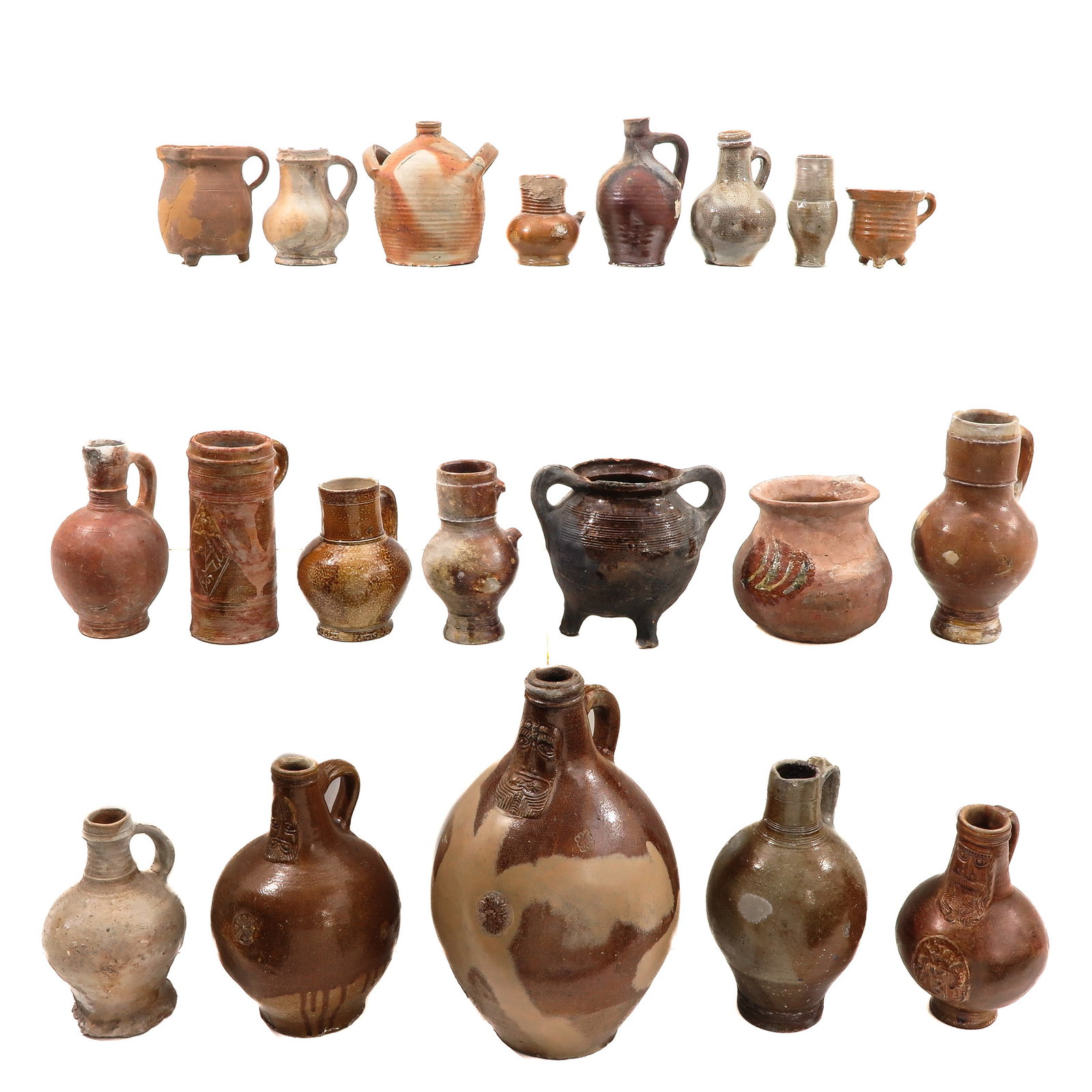 An Assortment of Earthenware: earthenware, including 17th century bearded man jug, highest 40 cm., in various conditions