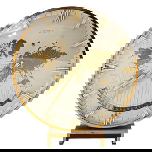 A World Clock Signed Kienzle: signed Kienzle, automatic, designed by Heinrich Muller, Germany, ca. 1950, height 29 cm.