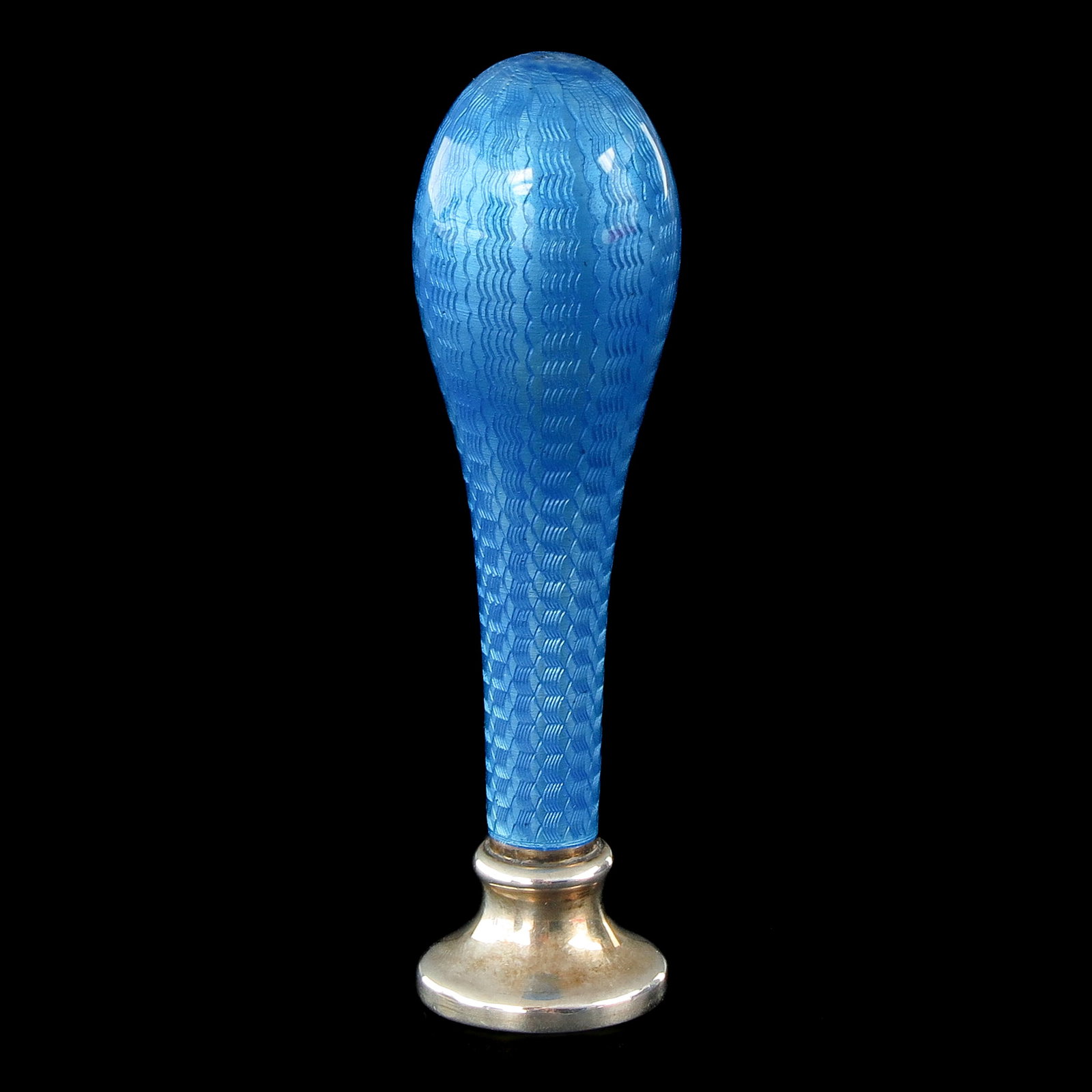 A Guilloché Enamel Wax Seal Stamp: silver with blue Guilloché enamelling, early 20th century, height 65 mm.
