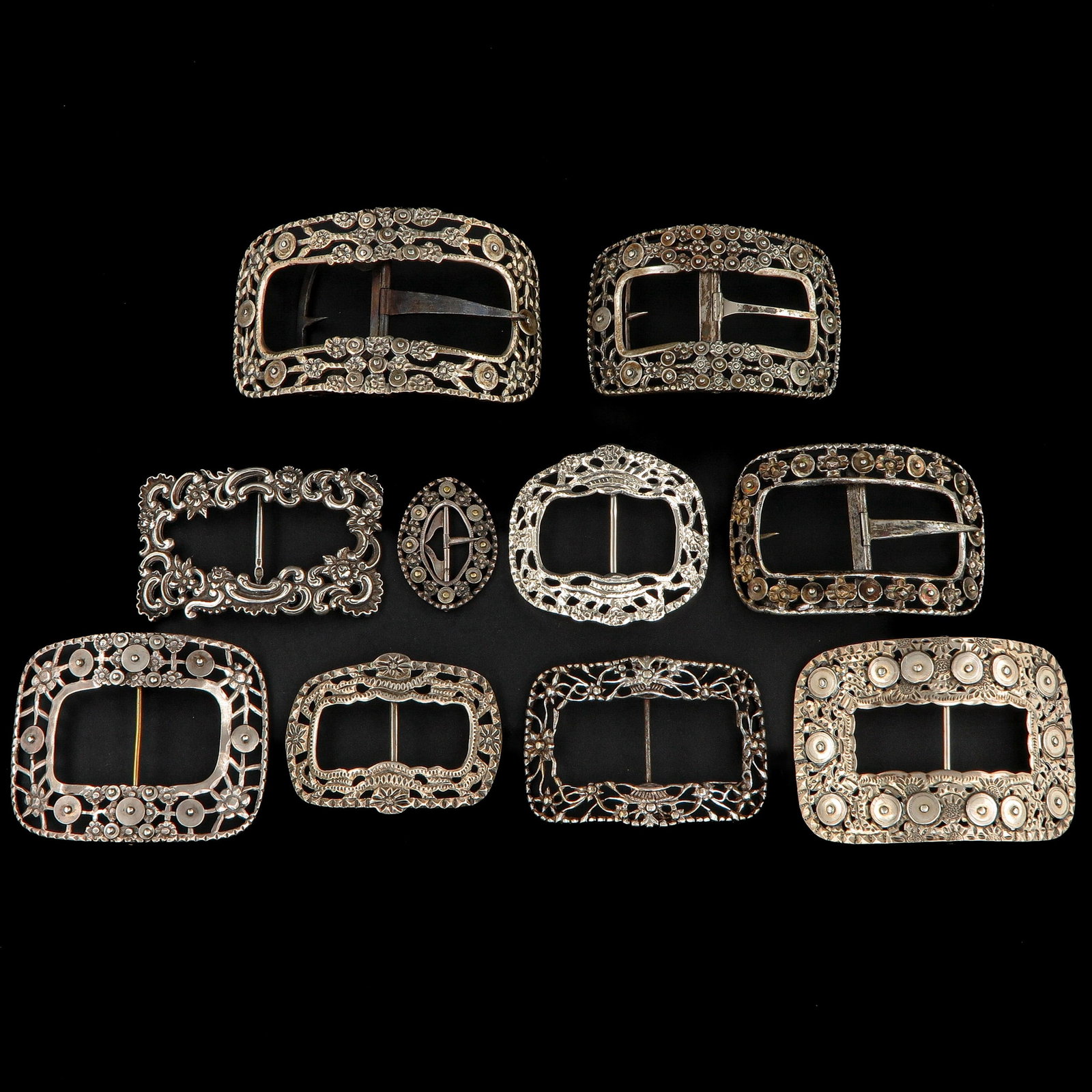 A Group of Silver Buckles: consisting of 10 pieces of silver buckles, widest 11 cm.