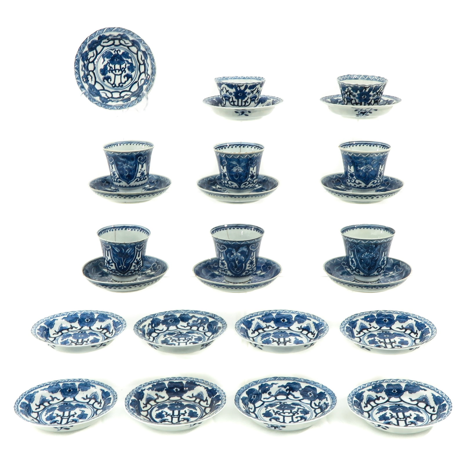 A Large Collection of Cups and Saucers: 25 pieces, Kangxi Period, largest saucers are 13 cm. in diameter, in diverse conditions.