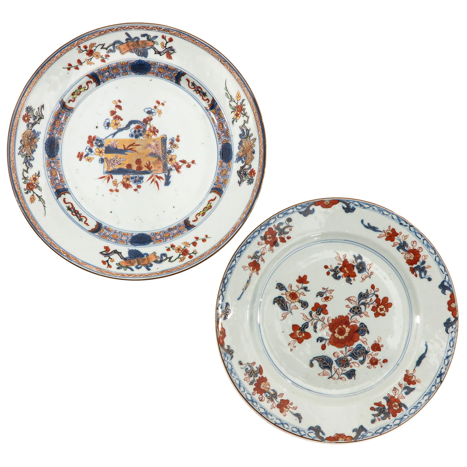 A Lot of 2 Imari Plates: Floral decor in iron red, blue and gilt enamels, 18th Century, 28 cm. in diameter, fritting.