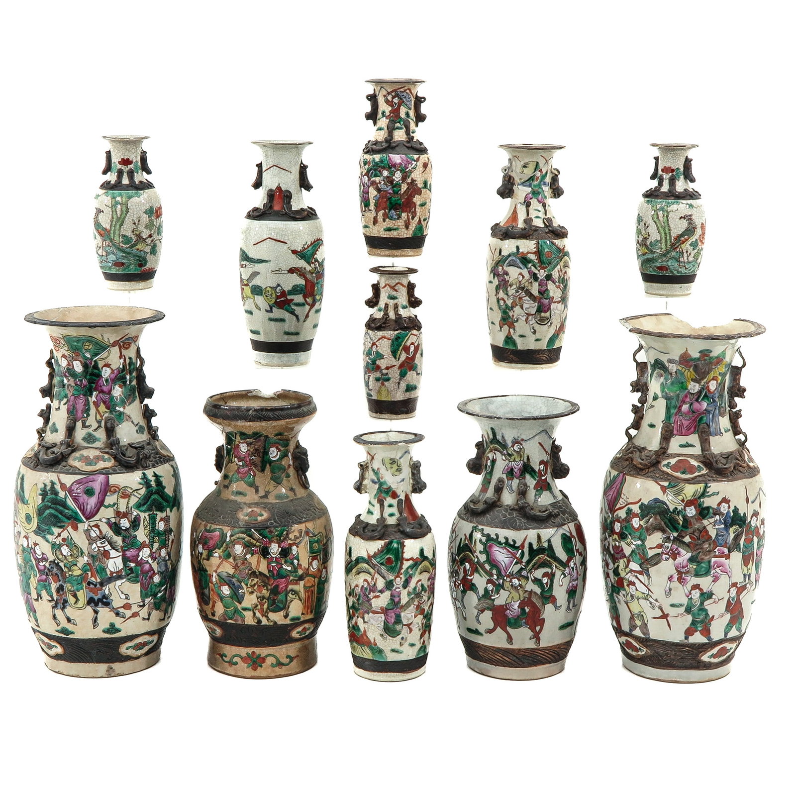 A Collection of 11 Nanking Vases: In a variety of decors, 19th Century, tallest vase is 45 cm., in diverse conditions.