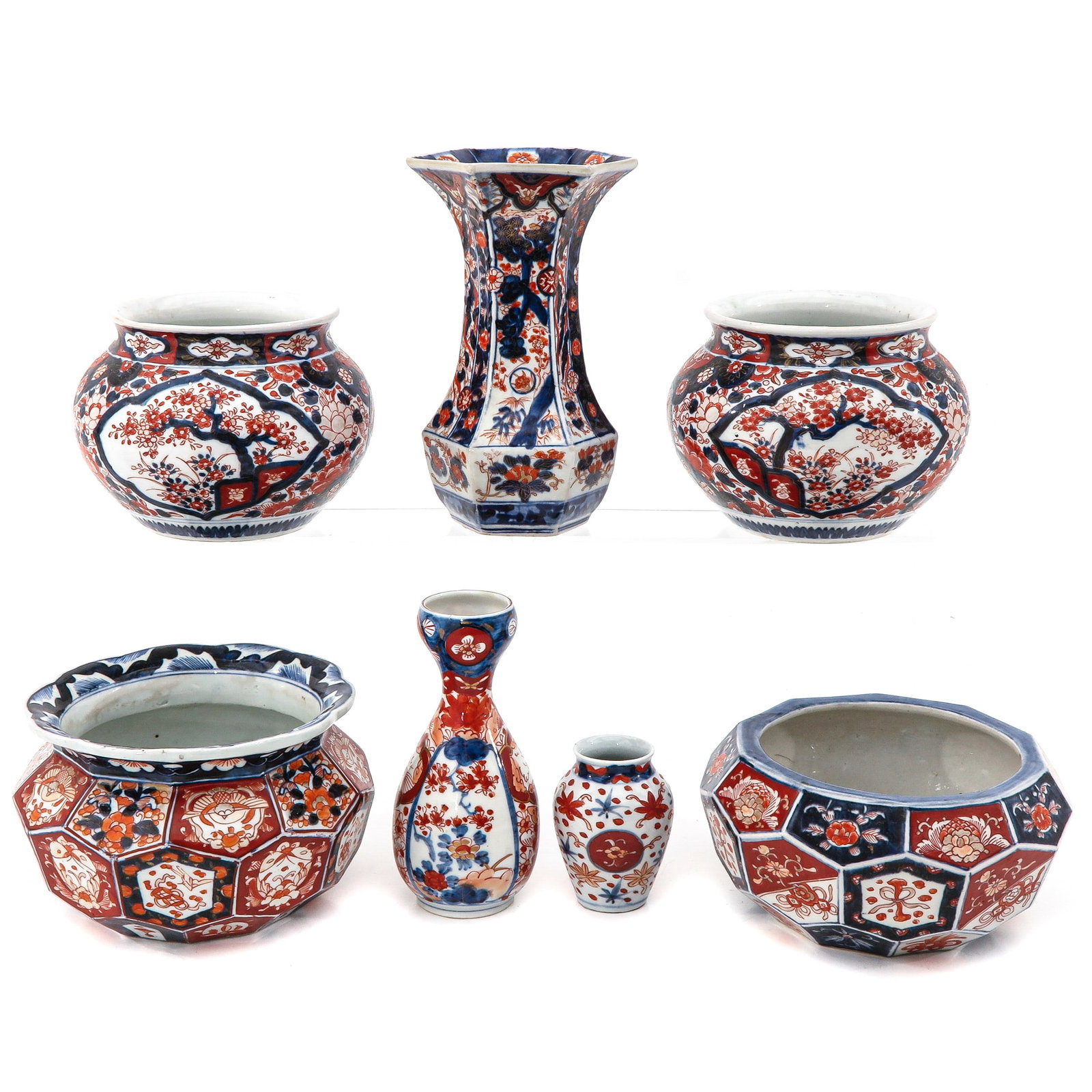 A Collection of Porcelain: 7 pieces, including platners and vases, tallest vase is 23 cm., hairline.