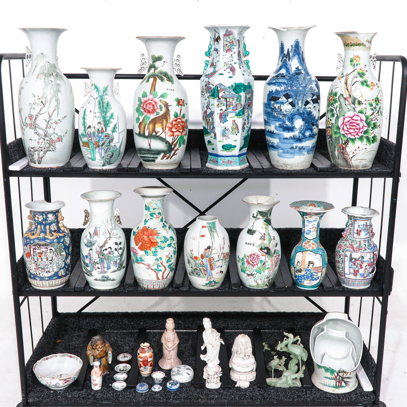 A Large Collection of Porcelain: Including 18th / 19th Century, vases, sculptures plates and a variety of items, tallest vase is 60 cm., in diverse conditions.