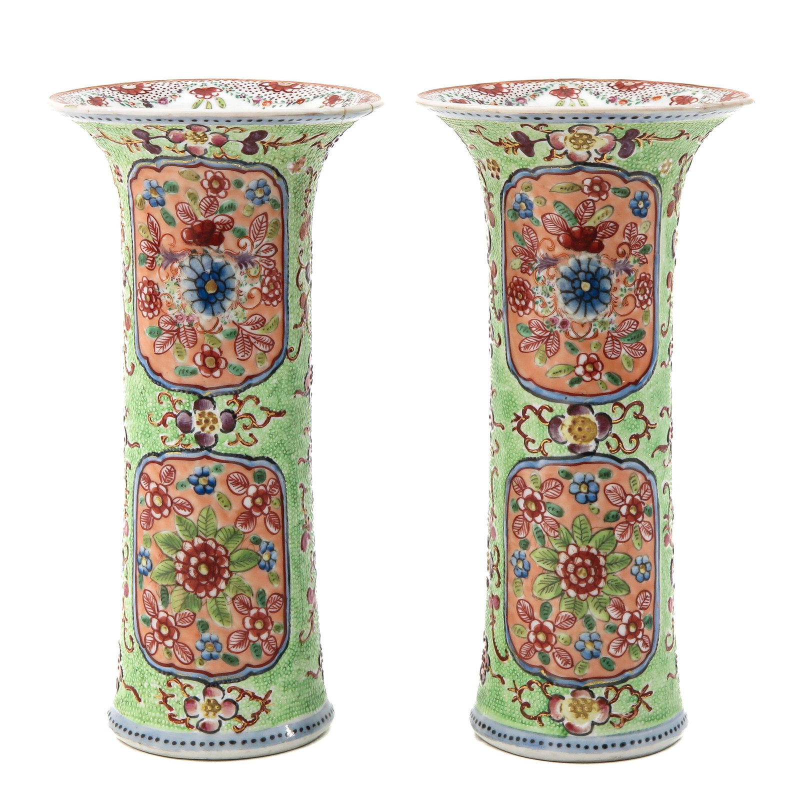 A Pair of Famille Rose Garniture Vases: Light green ground decorated with flowers in Famille Rose enamels, 24 cm. in diameter, one with restoration on rim.