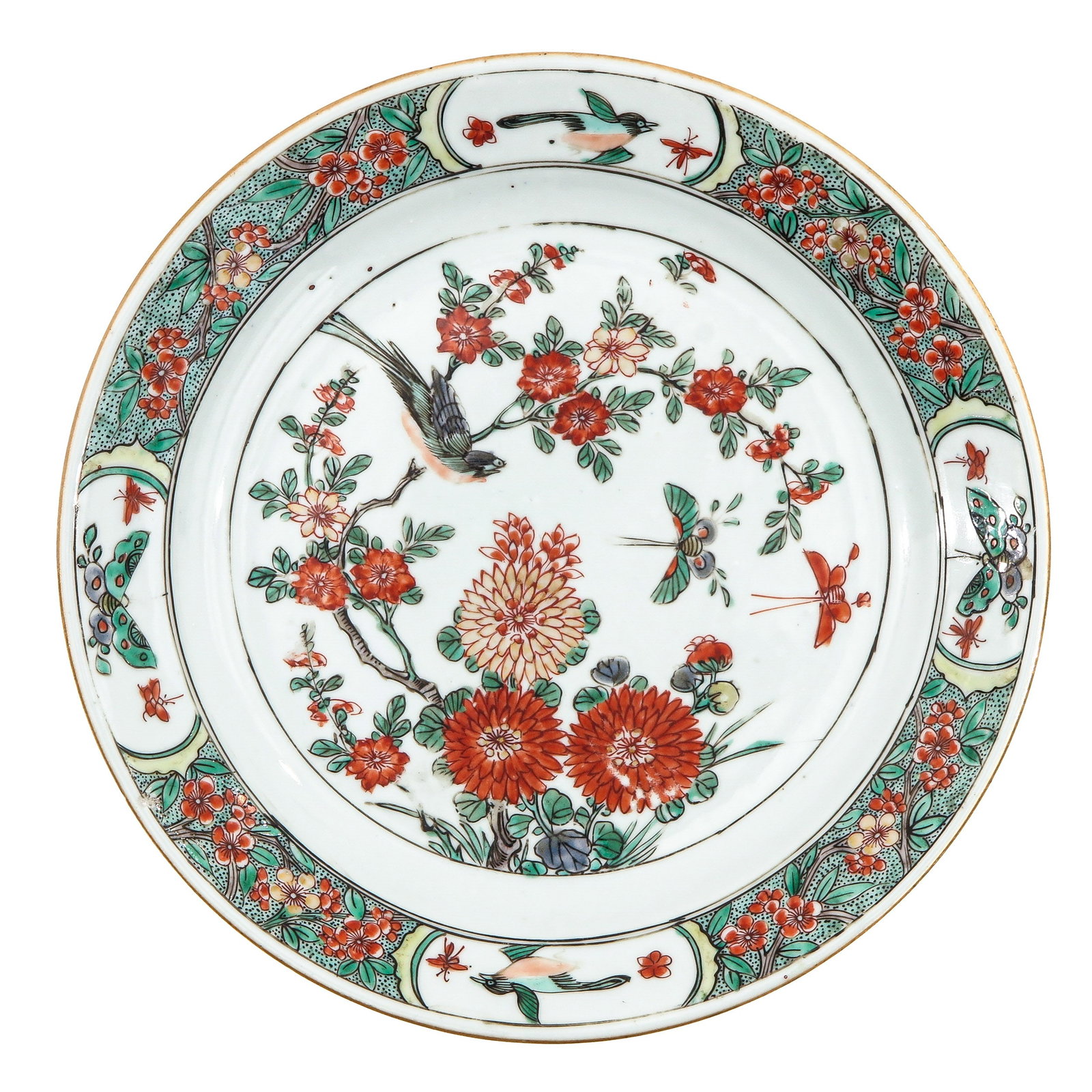 A Famille Verte Plate: Decorated with birds, flowers and butterfly, Kangxi Period, 24 cm. in diameter.