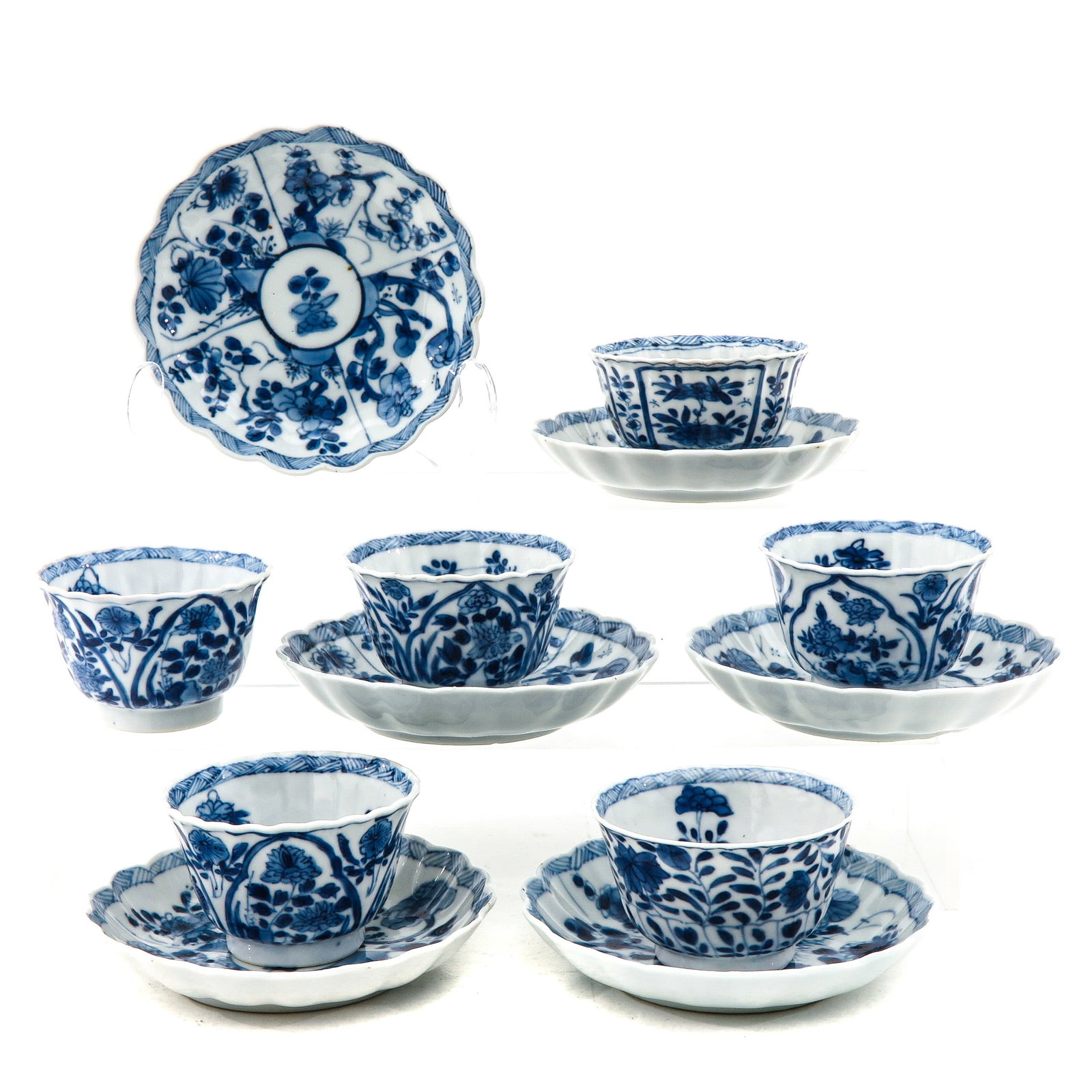 A Collection of 6 Cups and Sauers: Floral decor, 18th Century, saucers are 11 cm. in diameter.