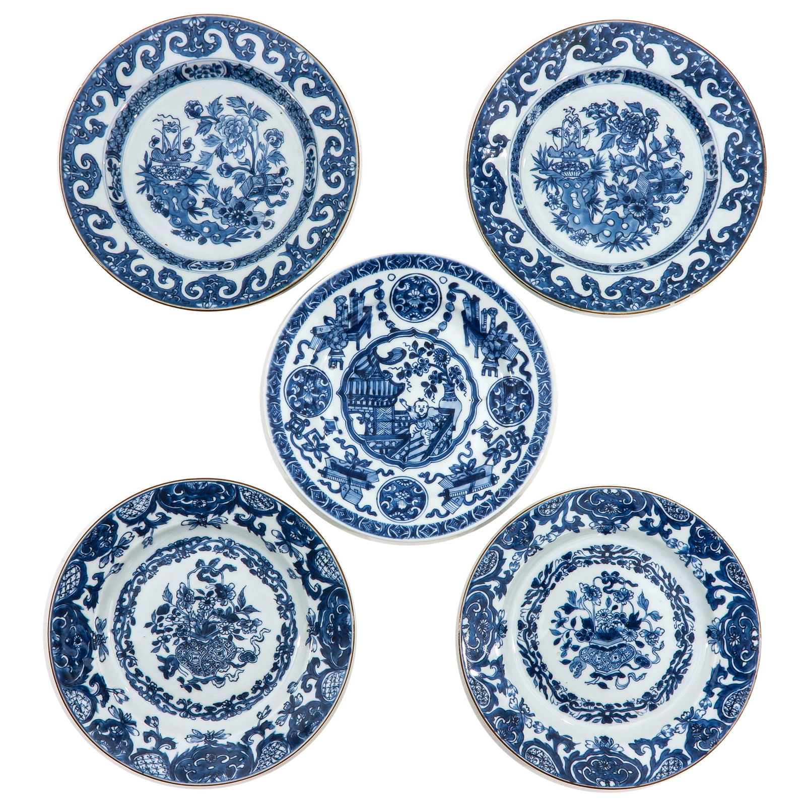 A Collection of 5 Blue and White Plates: IN a variety of decors, 18th Century, 23 cm. in diameter, chip and hairline.