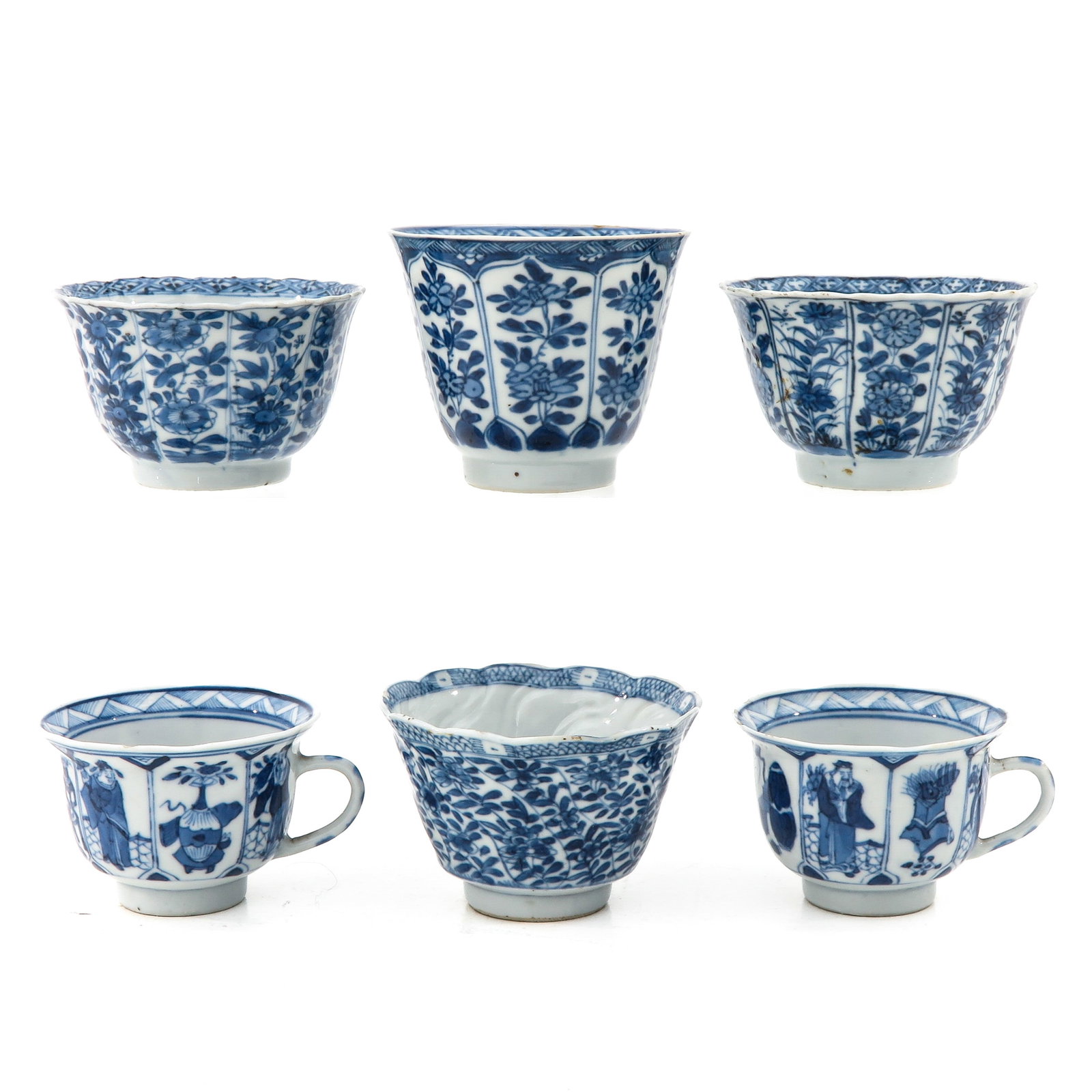 A Collection of 6 Cups: In a variety of blue and white decors, including Kangxi Period, largest cup is 8 cm. in diameter, in diverse conditions.