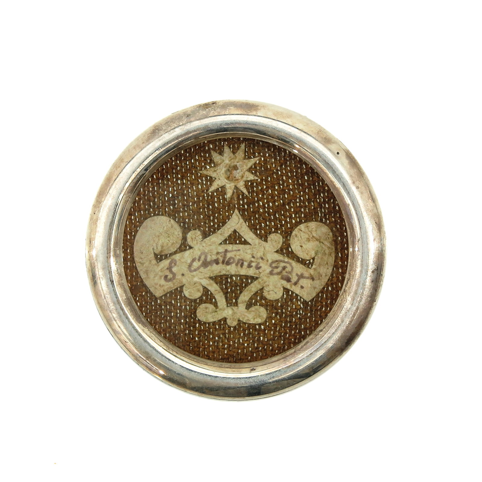 A Relic Theca: containing relic of Saint Anthony of Padua, diameter 4 cm., with certificate