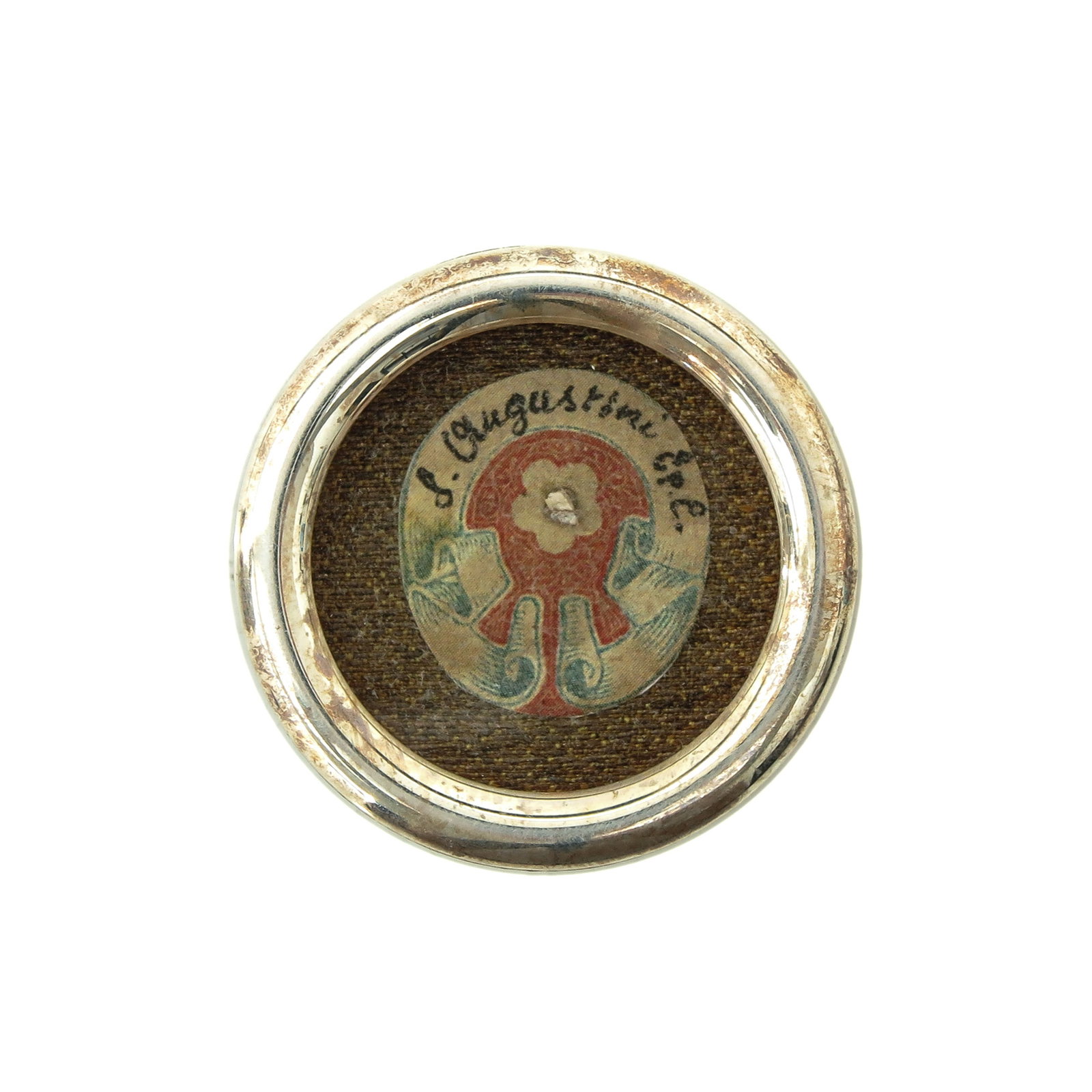 A Relic Theca: containing relic of Saint Augustine, diameter 4 cm., with certificate