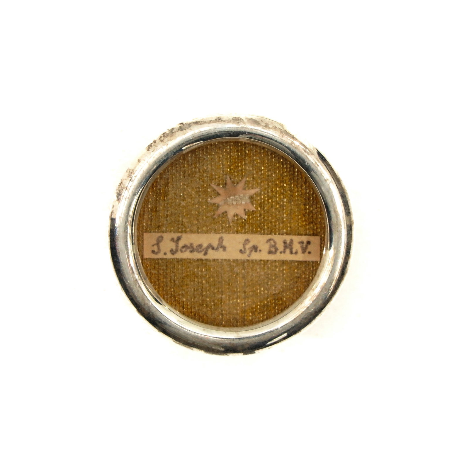 A Relic Theca: in which relic of Saint Joseph Sponsus B.M.V, diameter 4 cm., with certificate