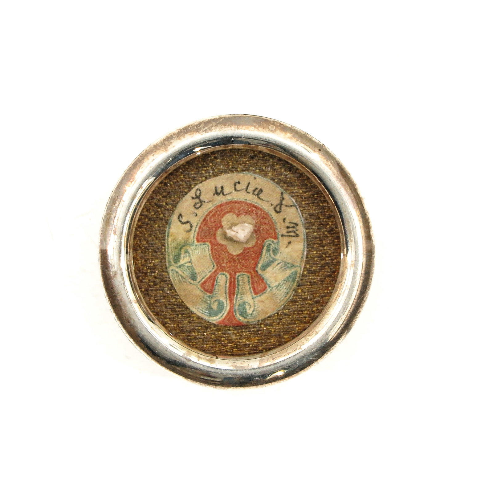 A Relic Theca: containing relic of Saint Lucia, diameter 4 cm., with certificate