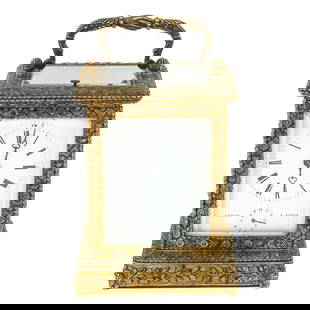 A Travel Clock: signed Leroy à Paris, 1st half 19th century, petit and grande sonnerie, with a white enamel dial with Roman numerals, blued steel Breguet-style hands and a small alarm dial at six o'clock, in the ori