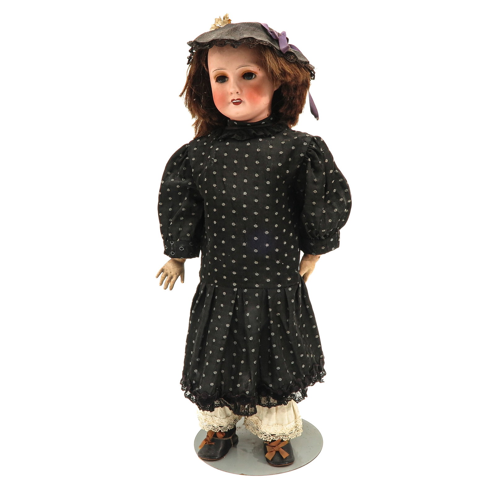 A Jumeau Doll: Jumeau, marked UNIS France, 301, with open mouth and composition body, height 61 cm.