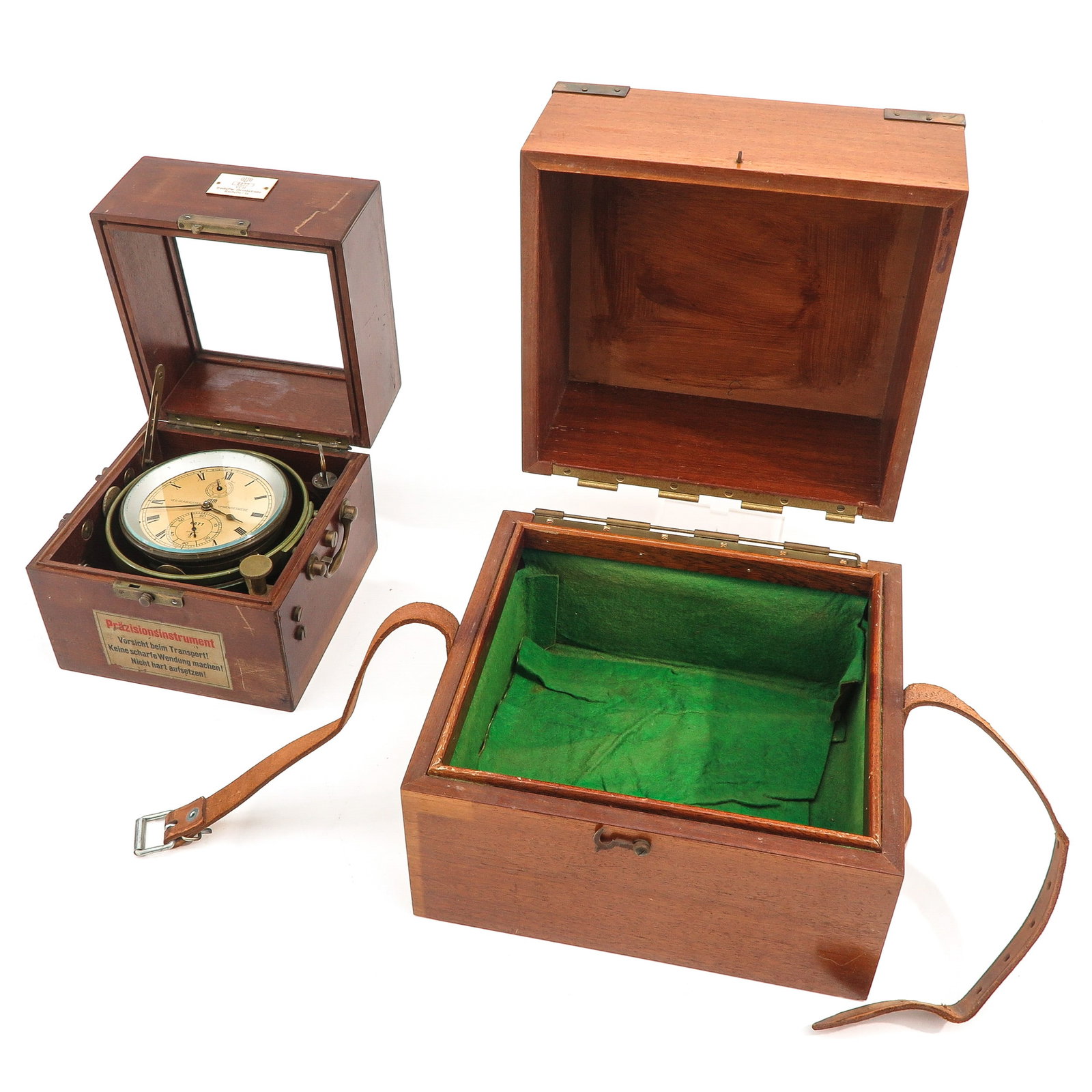 A Ships Chronometer: brand GUB, number 6677, in mahogany chest, and outer chest, 27 x 24 x 27 cm.