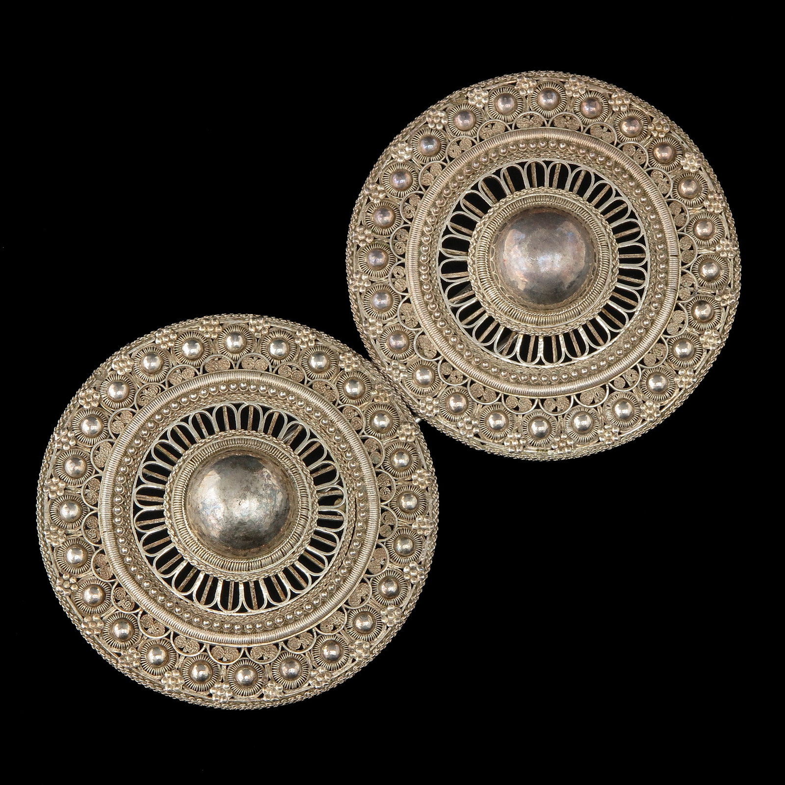 A Pair of Silver Broekstukken: trouser pieces, silver, from the costume of Zeeuws Vlaanderen, diameter 95 mm.