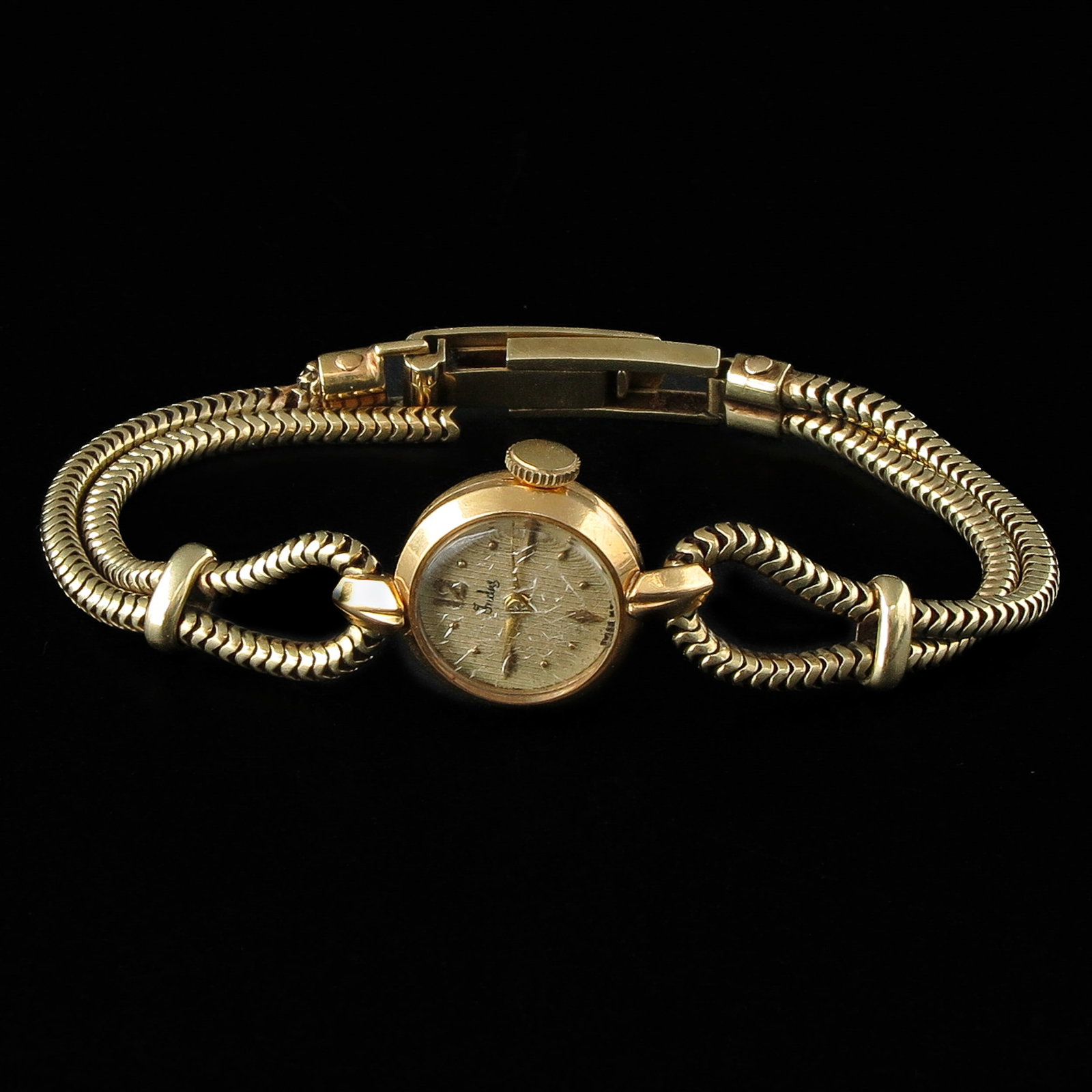 A Ladies 18KG Watch: brand Indus, 14KG band